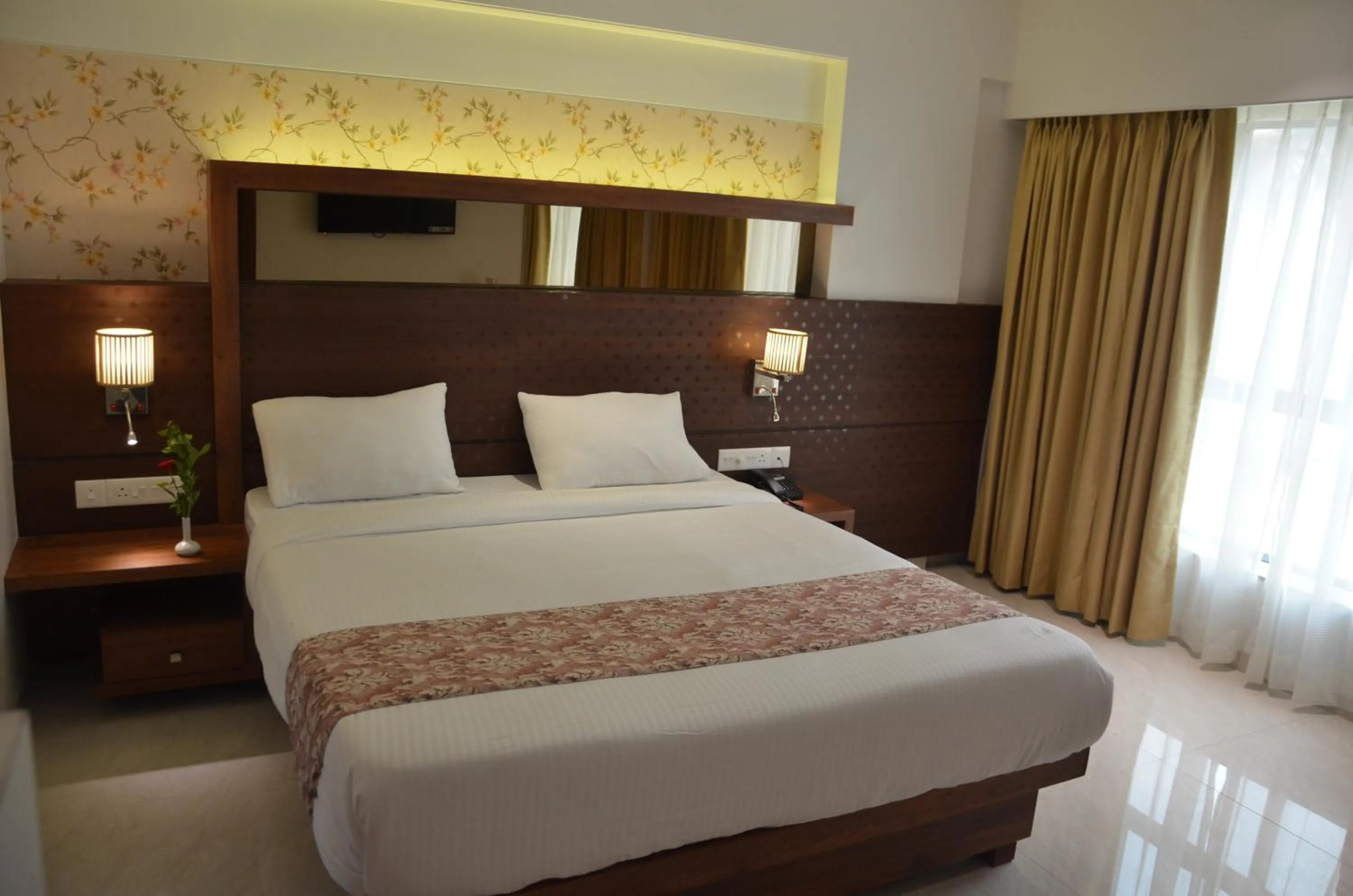 Bed in SriKrishna Paradise Hotel Thane Navi Mumbai