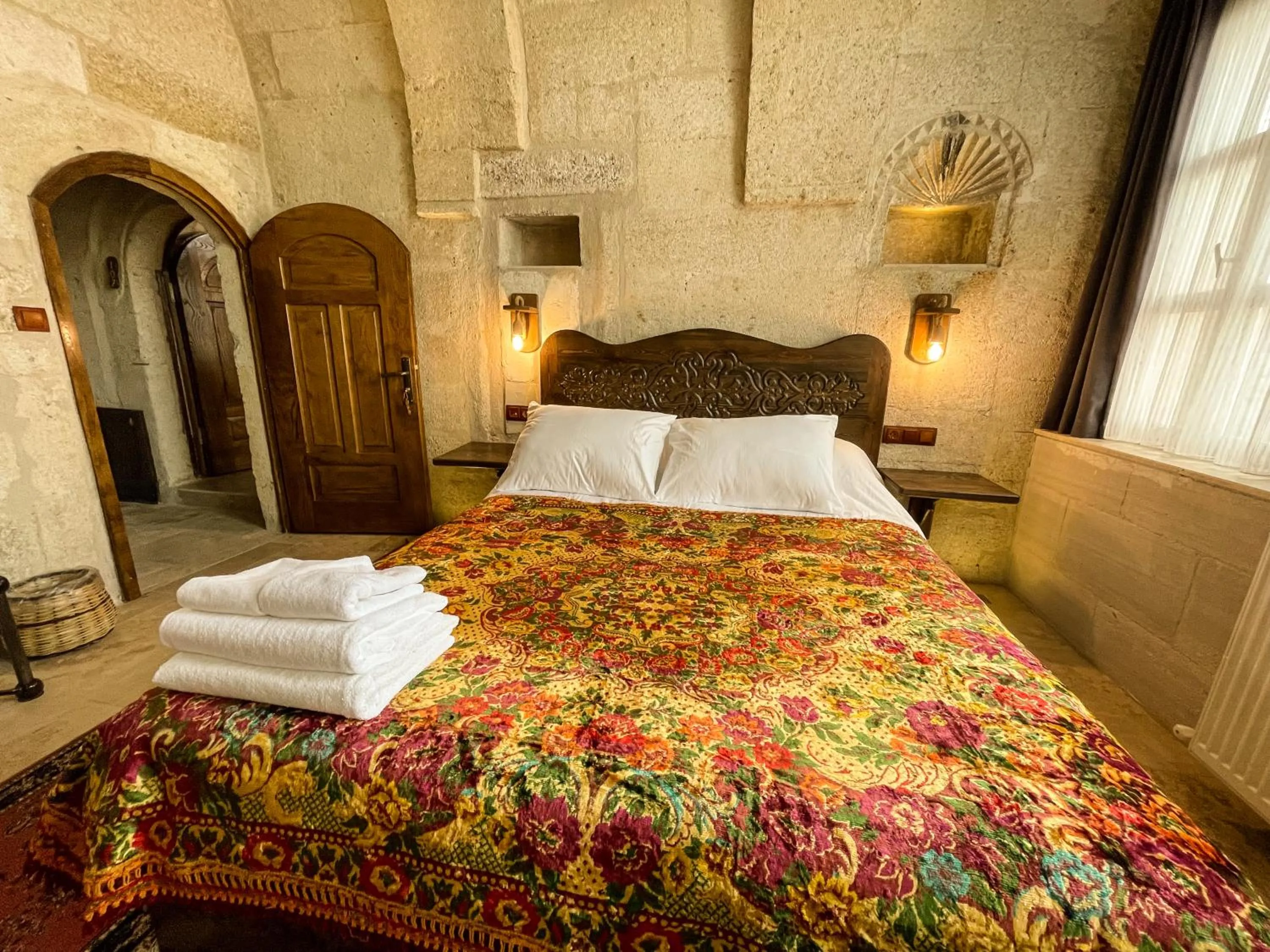 Bed in Takunya Cave Hotel