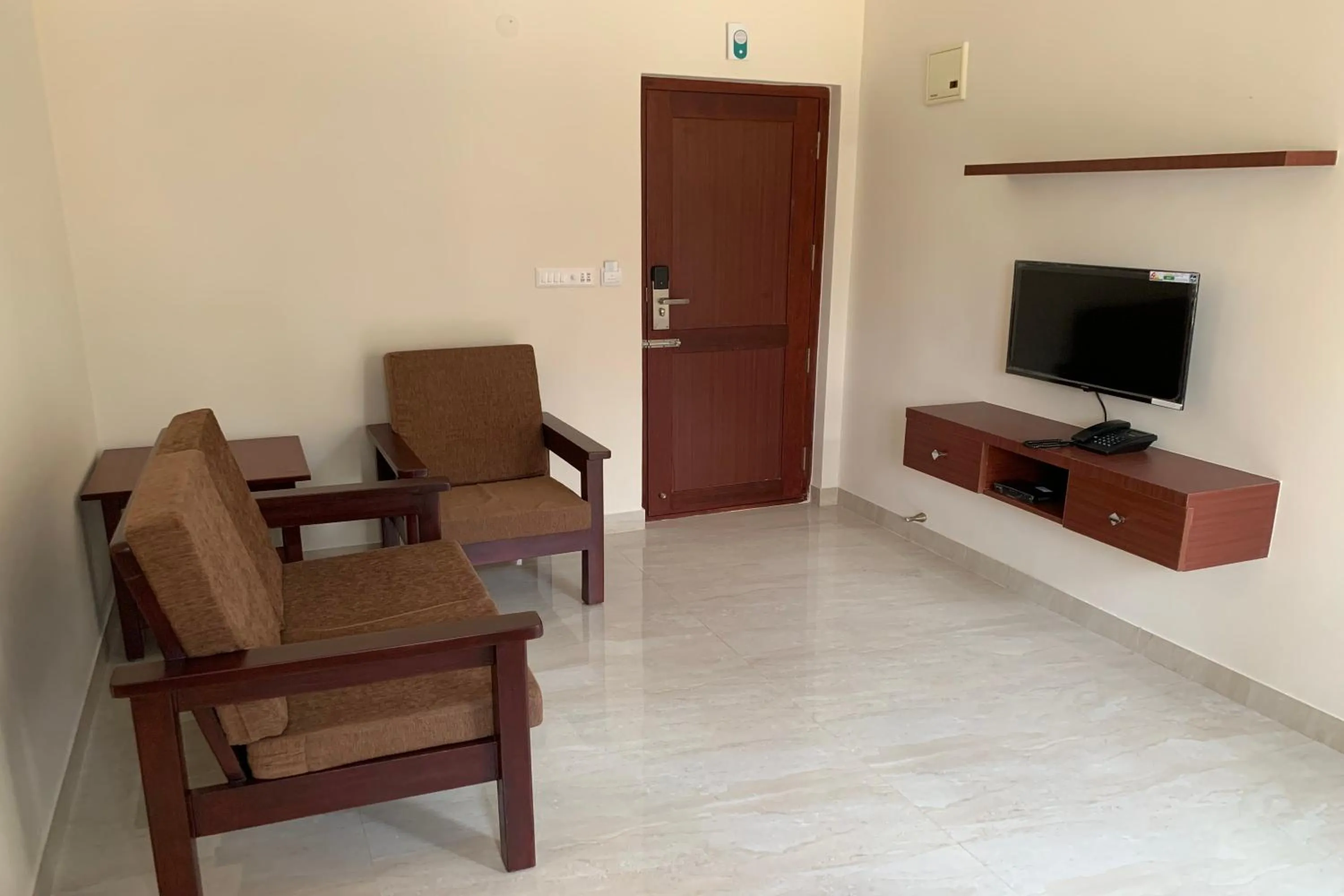 Living room in Vennela Hotel Apartments