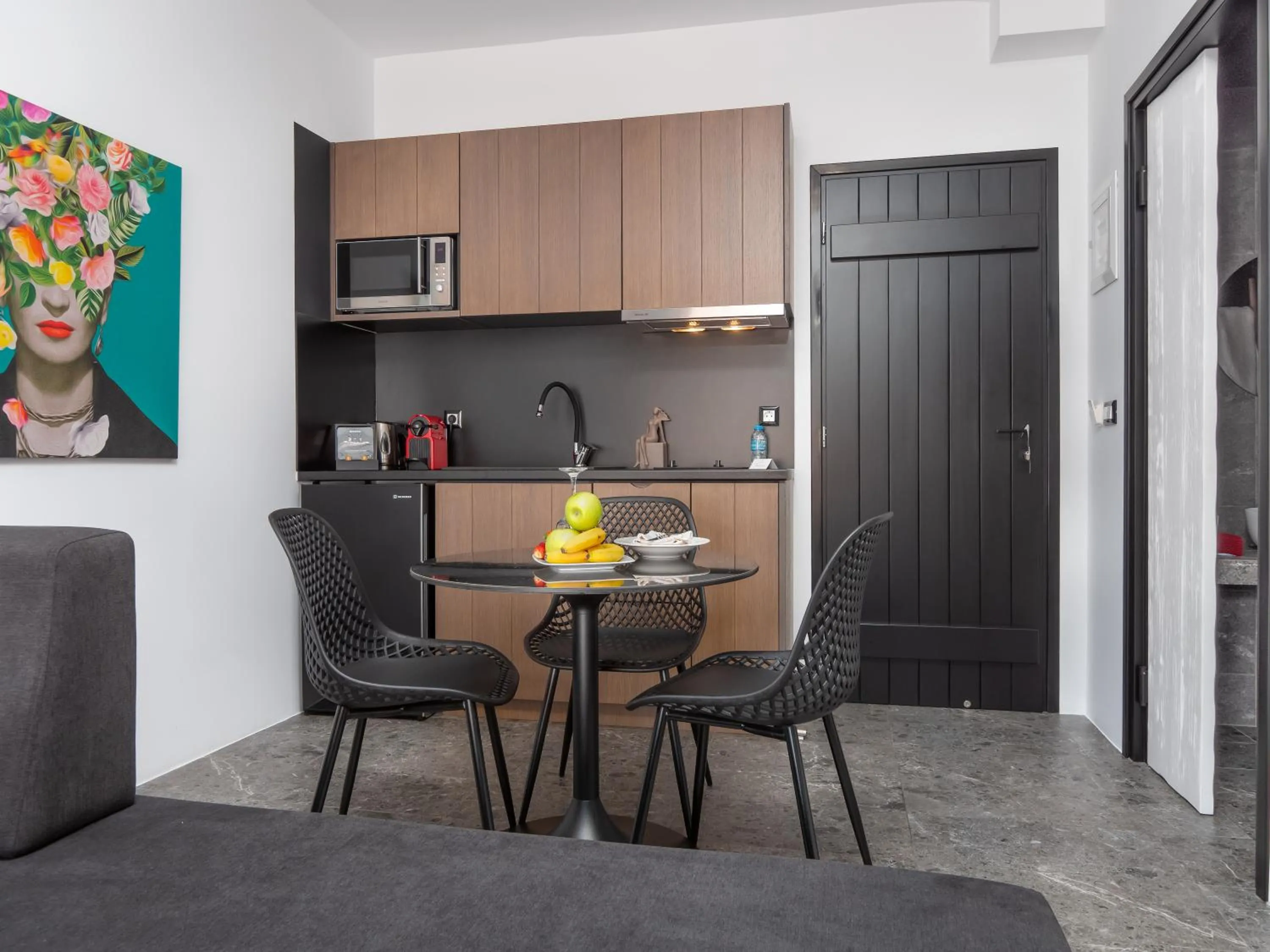 Kitchen or kitchenette in Kalypso Suites Hotel - Adults Only