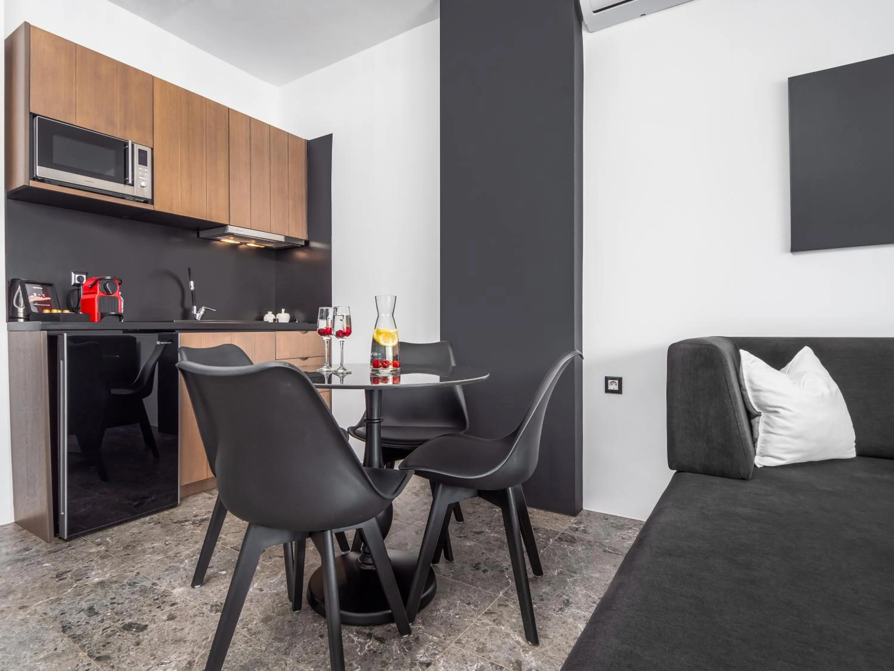 Kitchen or kitchenette in Kalypso Suites Hotel - Adults Only