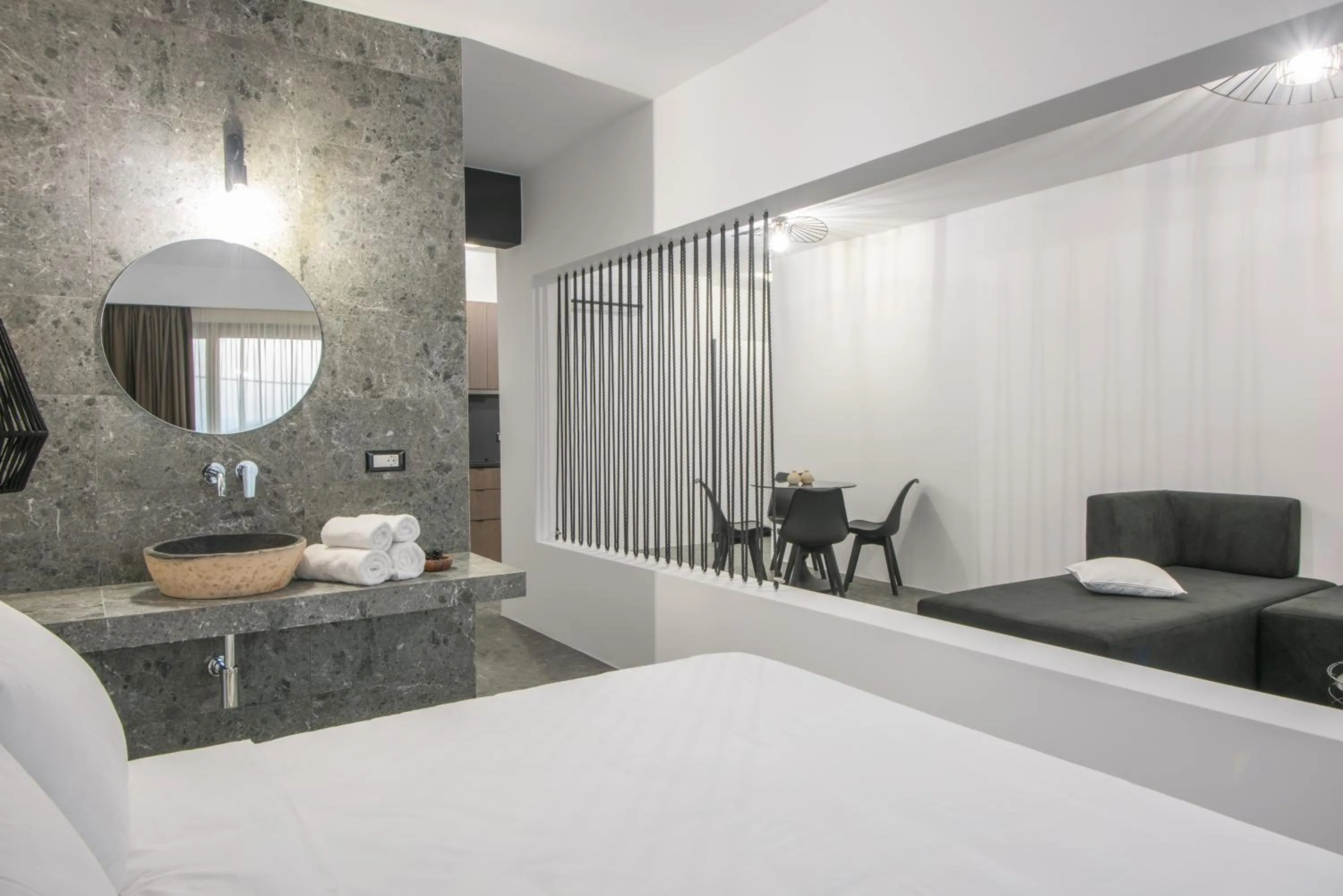 Photo of the whole room, Bed in Kalypso Suites Hotel - Adults Only