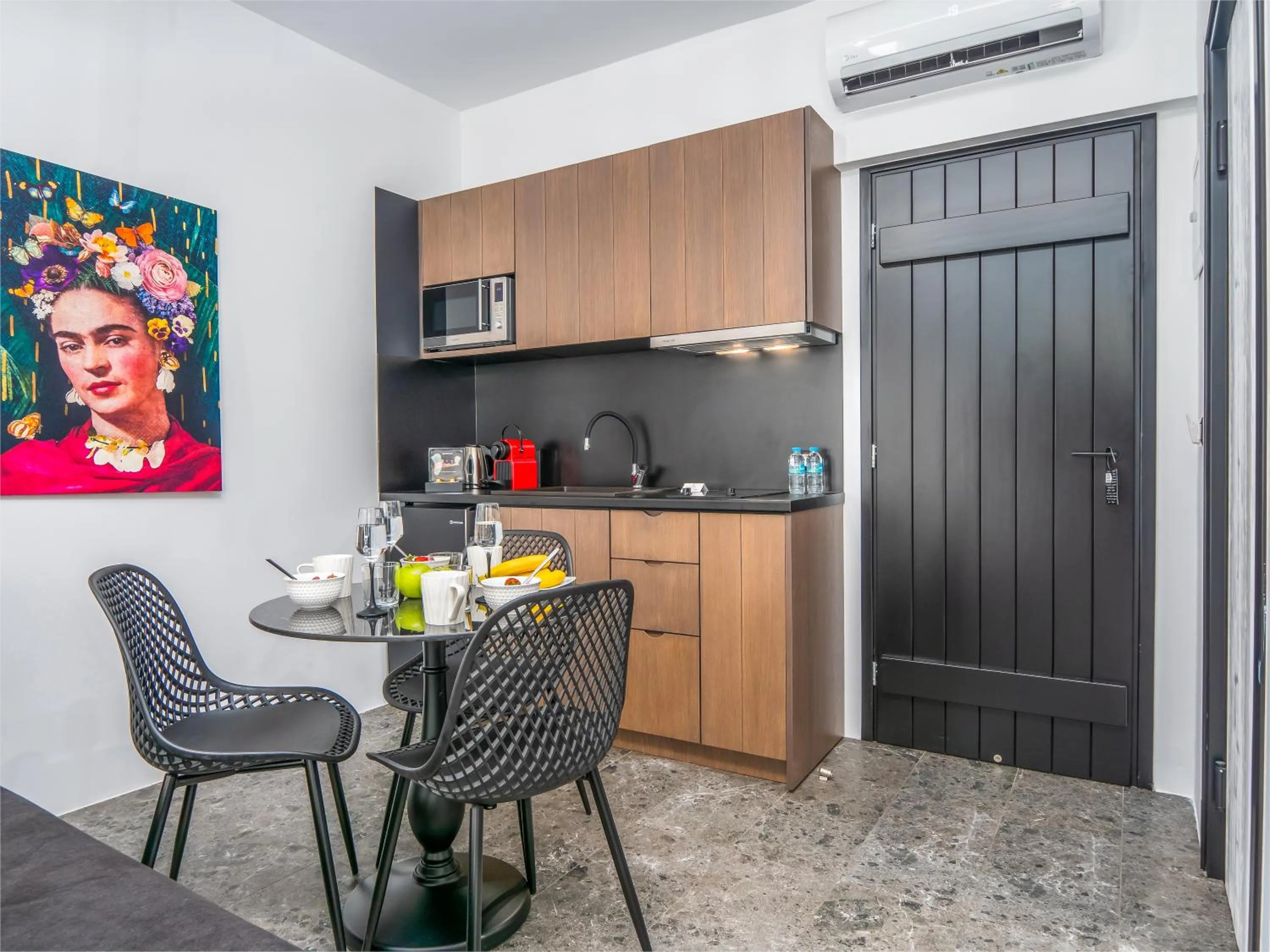 Kitchen or kitchenette in Kalypso Suites Hotel - Adults Only