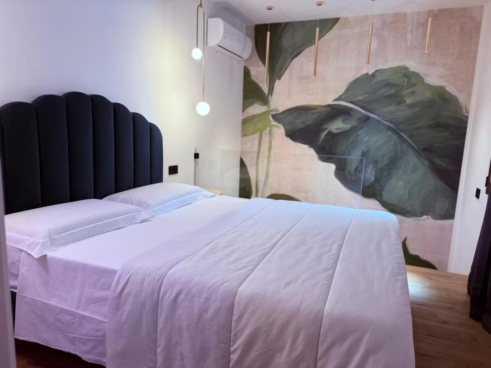 Bed in Krysos Luxury Rooms