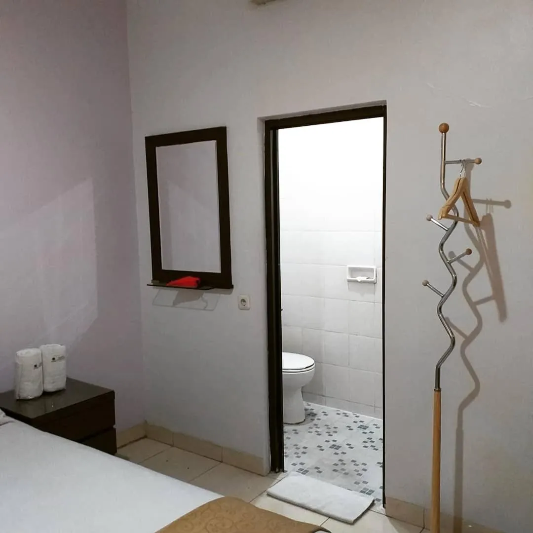 Bed in BLESSING RESIDENCE HOTEL