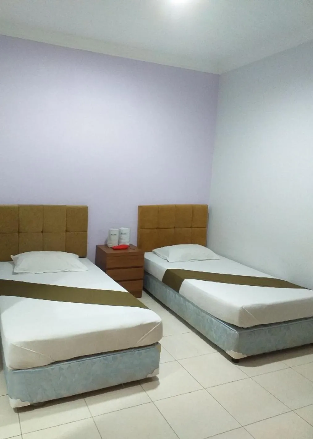 Bed in BLESSING RESIDENCE HOTEL