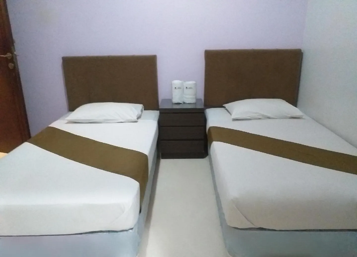 Bed in BLESSING RESIDENCE HOTEL