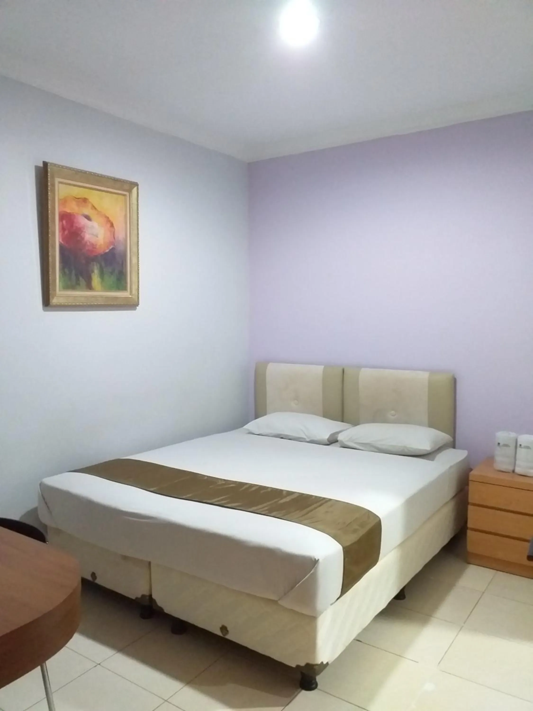 Bed in BLESSING RESIDENCE HOTEL