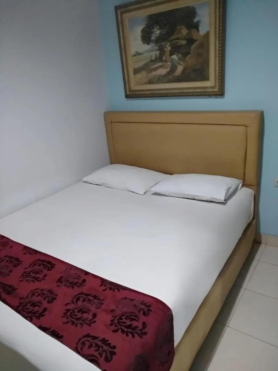 Bed in BLESSING RESIDENCE HOTEL