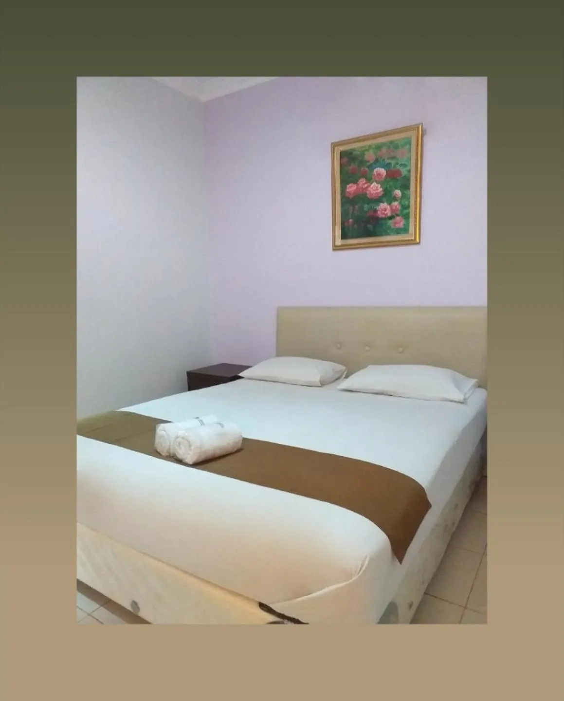 Bed in BLESSING RESIDENCE HOTEL