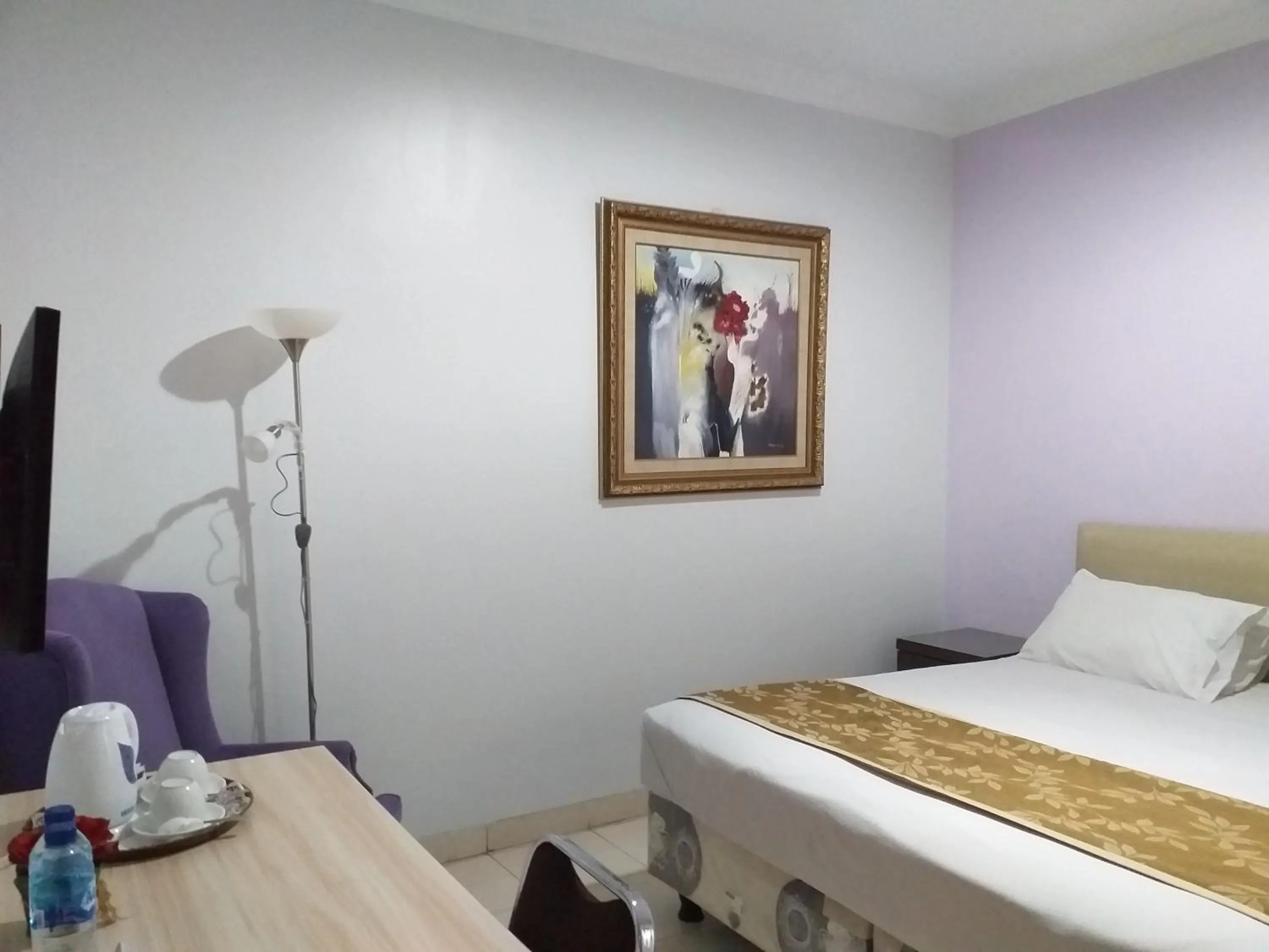 Bed in BLESSING RESIDENCE HOTEL