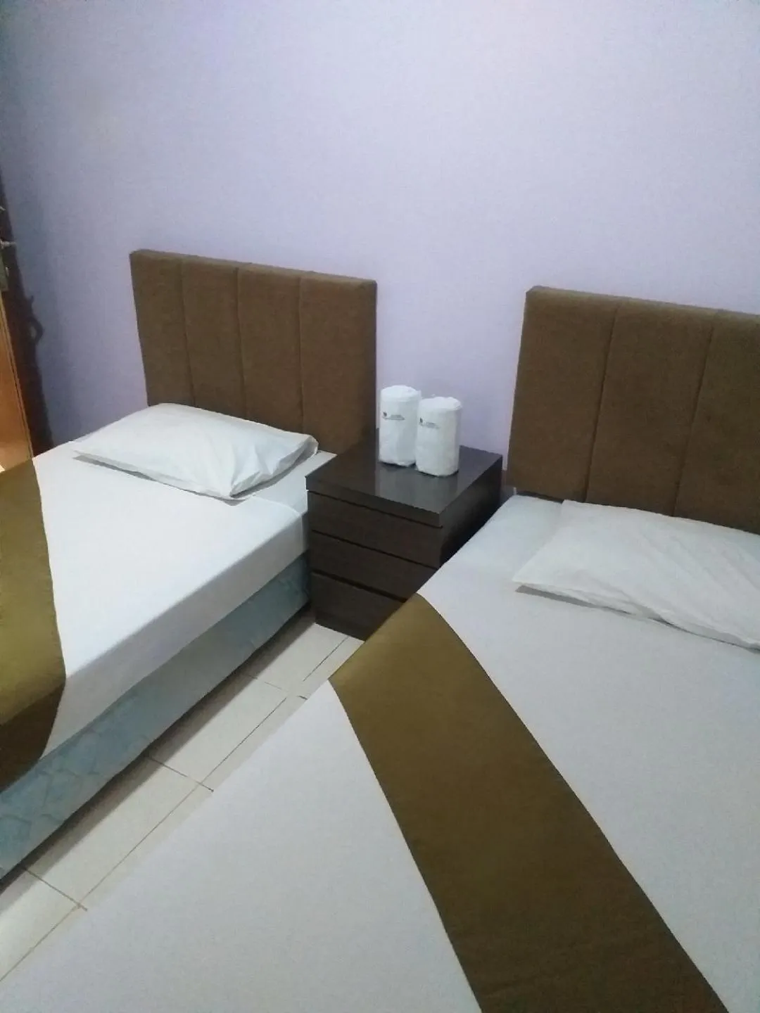Bed in BLESSING RESIDENCE HOTEL