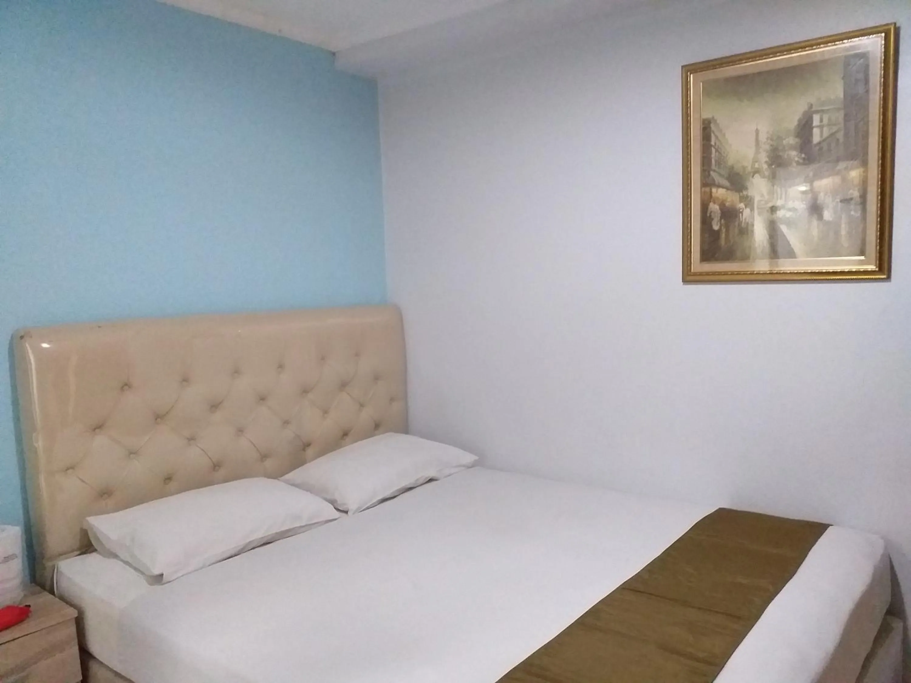 Bed in BLESSING RESIDENCE HOTEL