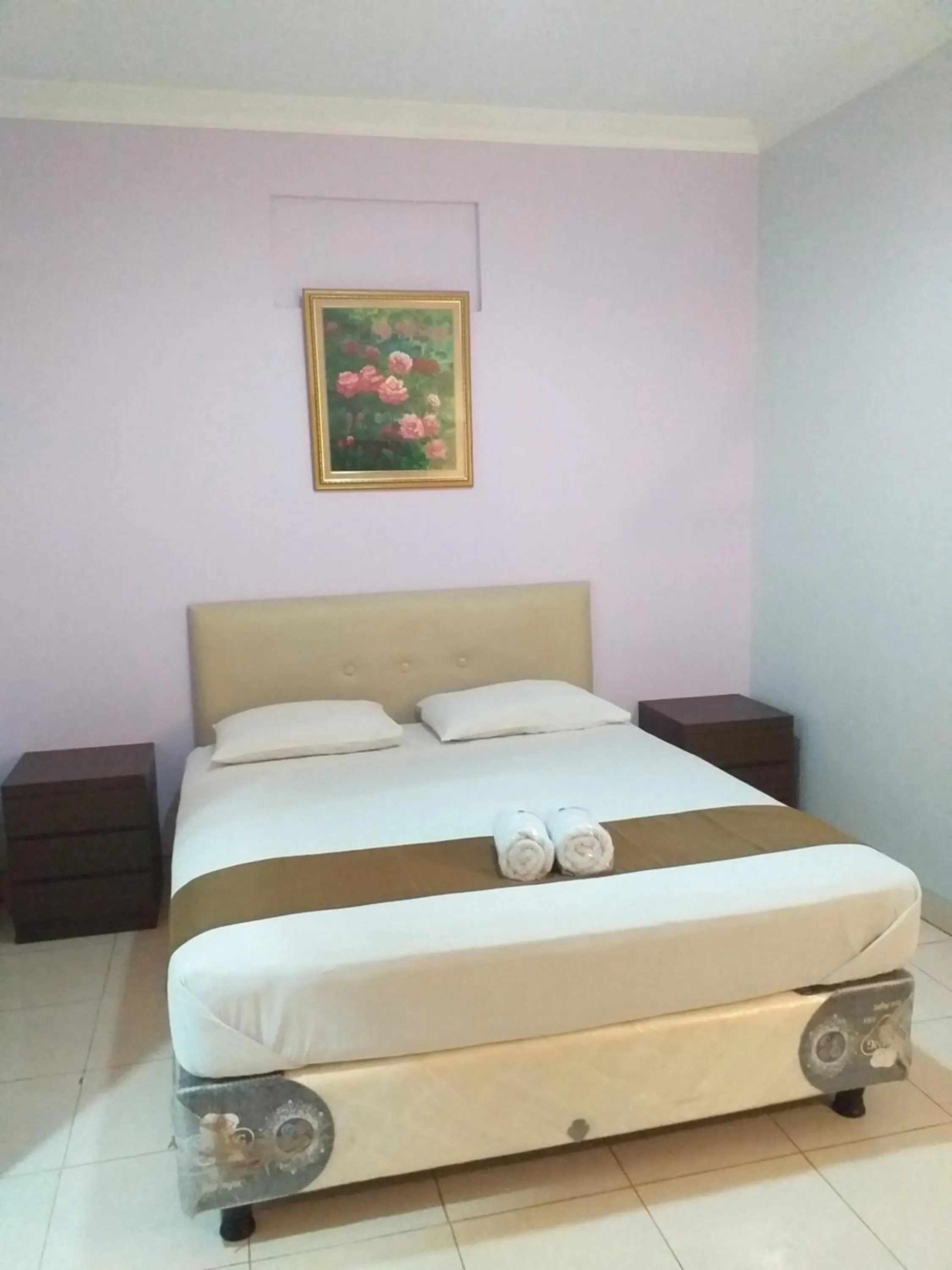 Bed in BLESSING RESIDENCE HOTEL