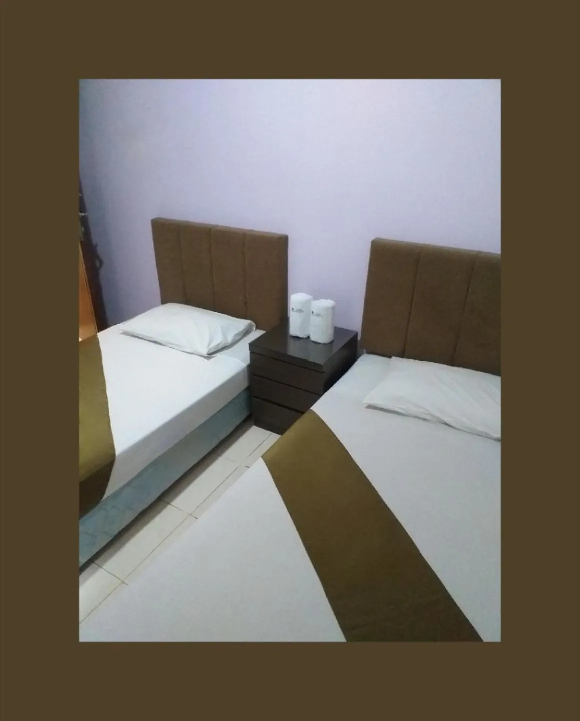Bed in BLESSING RESIDENCE HOTEL