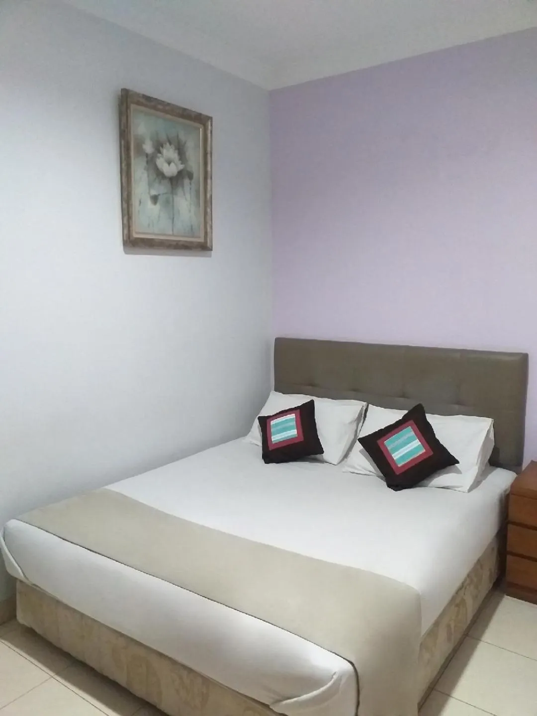 Bed in BLESSING RESIDENCE HOTEL