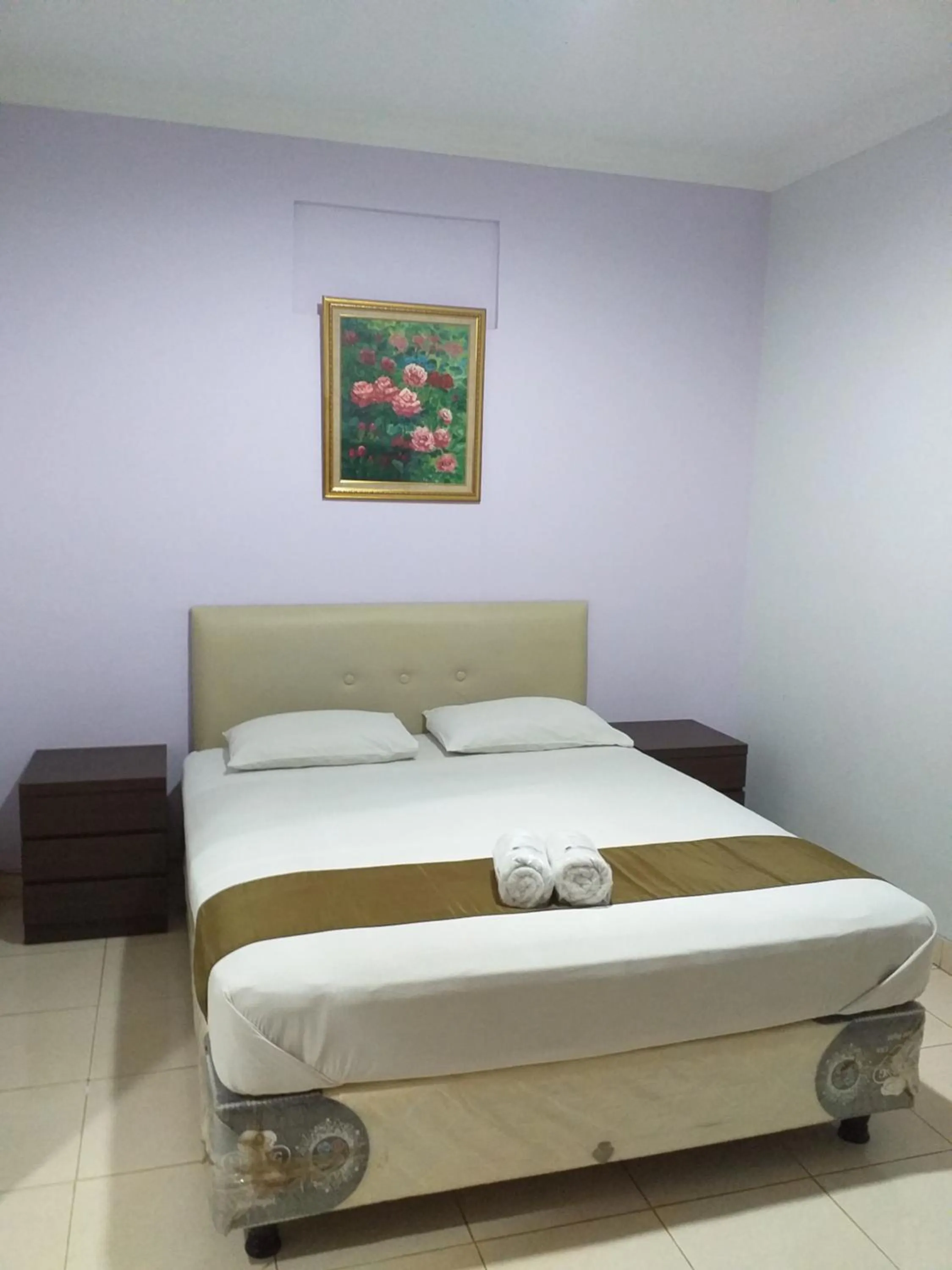 Bed in BLESSING RESIDENCE HOTEL