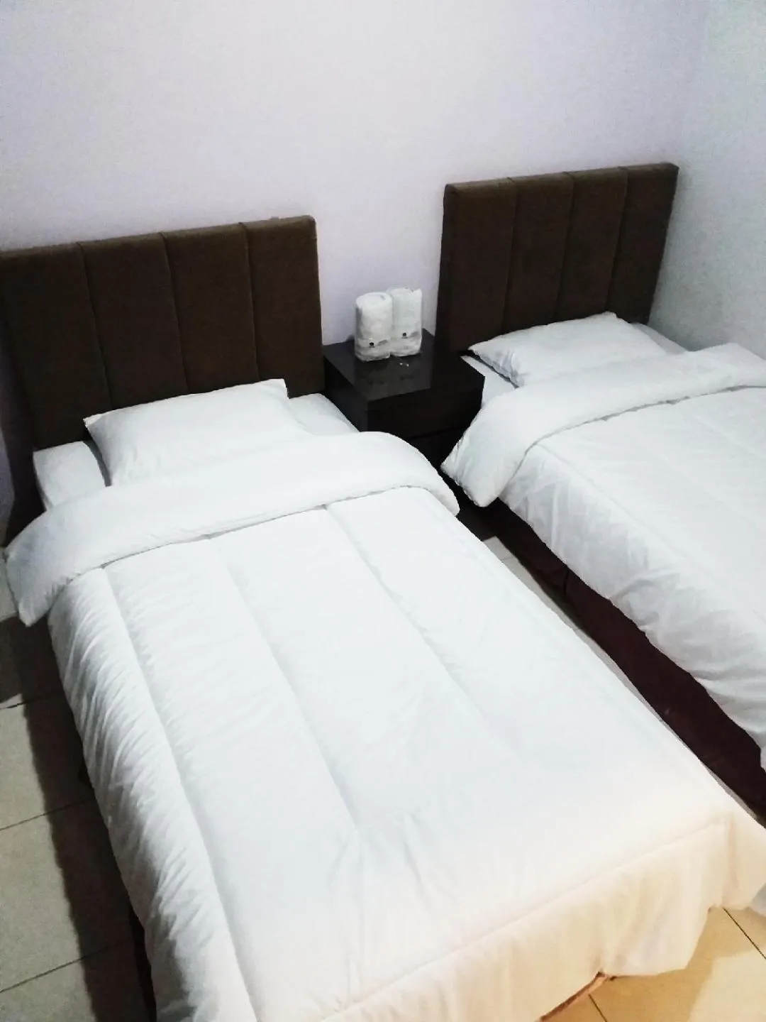 Bed in BLESSING RESIDENCE HOTEL