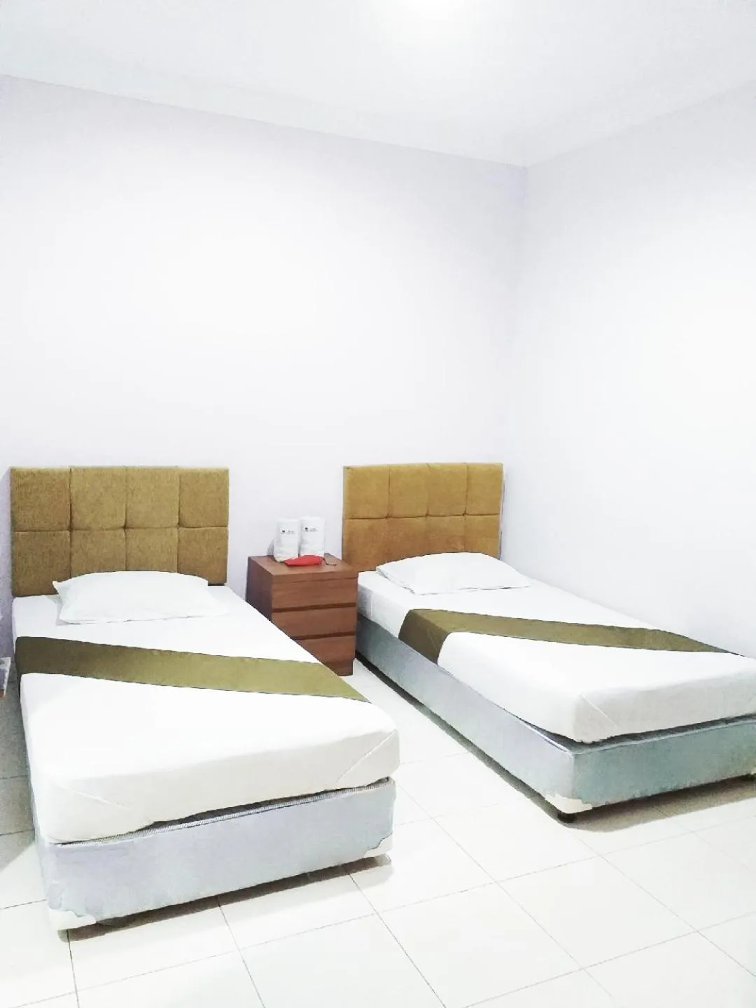 Bed in BLESSING RESIDENCE HOTEL