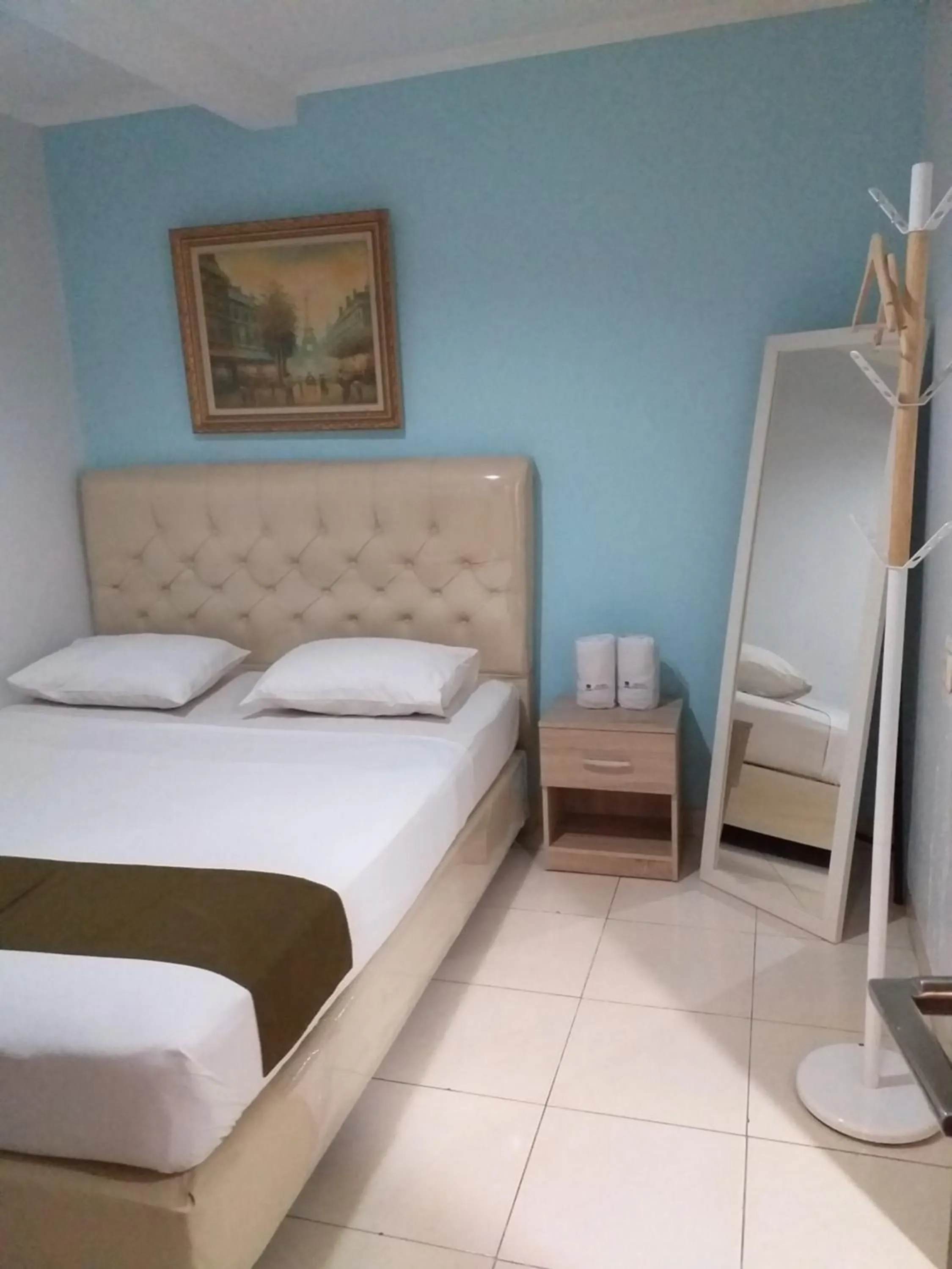 Bed in BLESSING RESIDENCE HOTEL