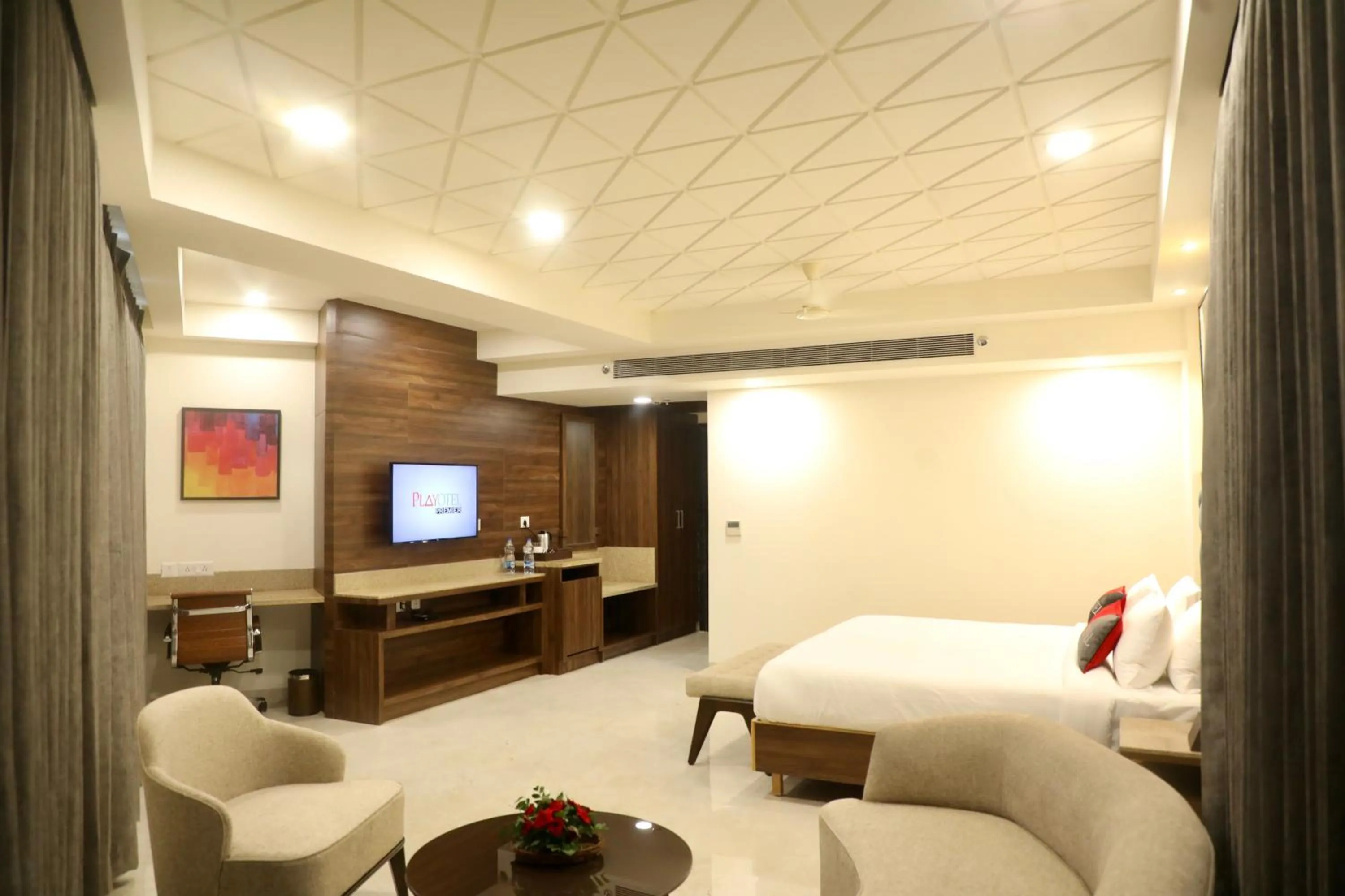 Bed in Playotel Premier Guna