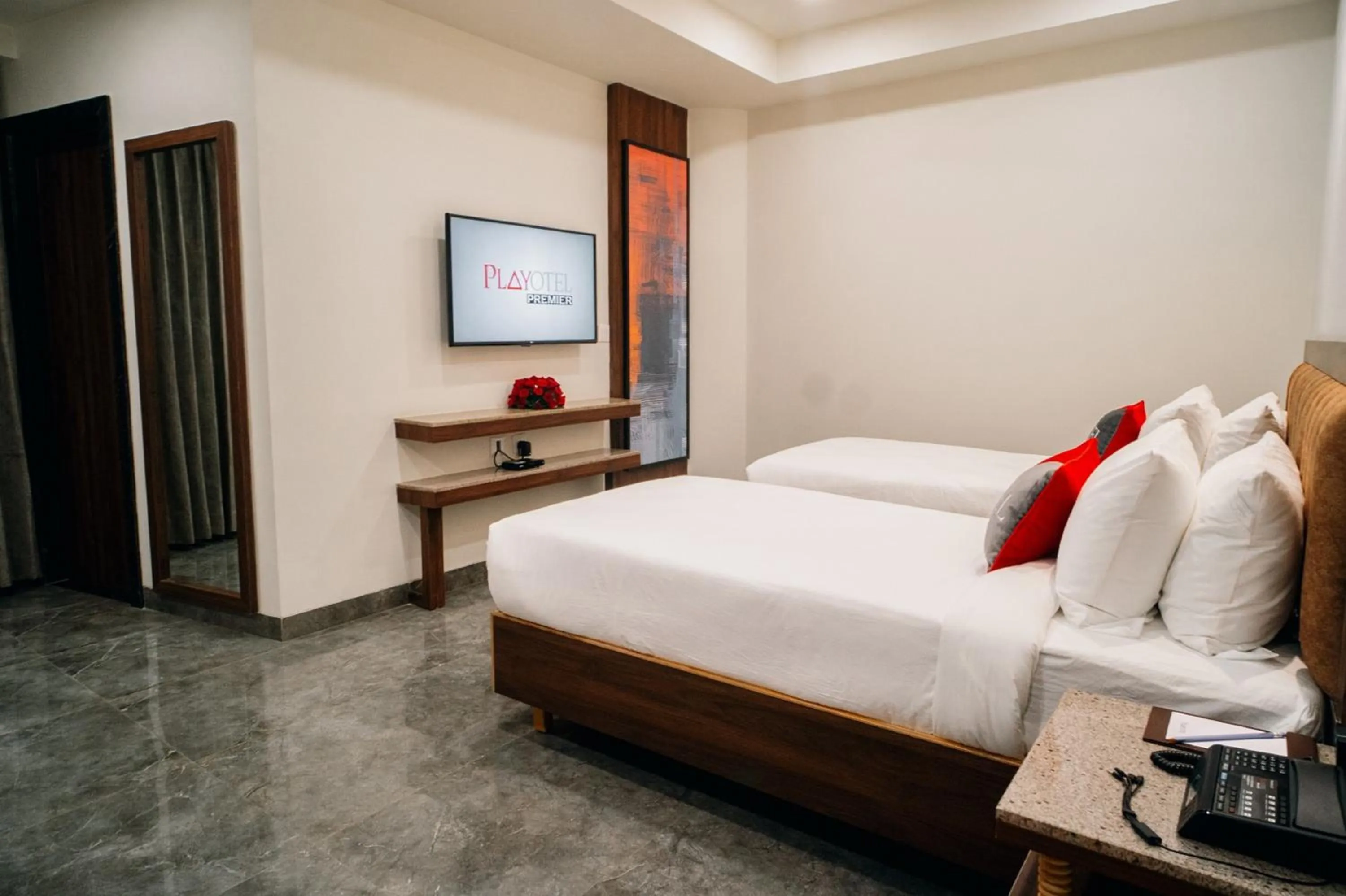 Bed in Playotel Premier Guna