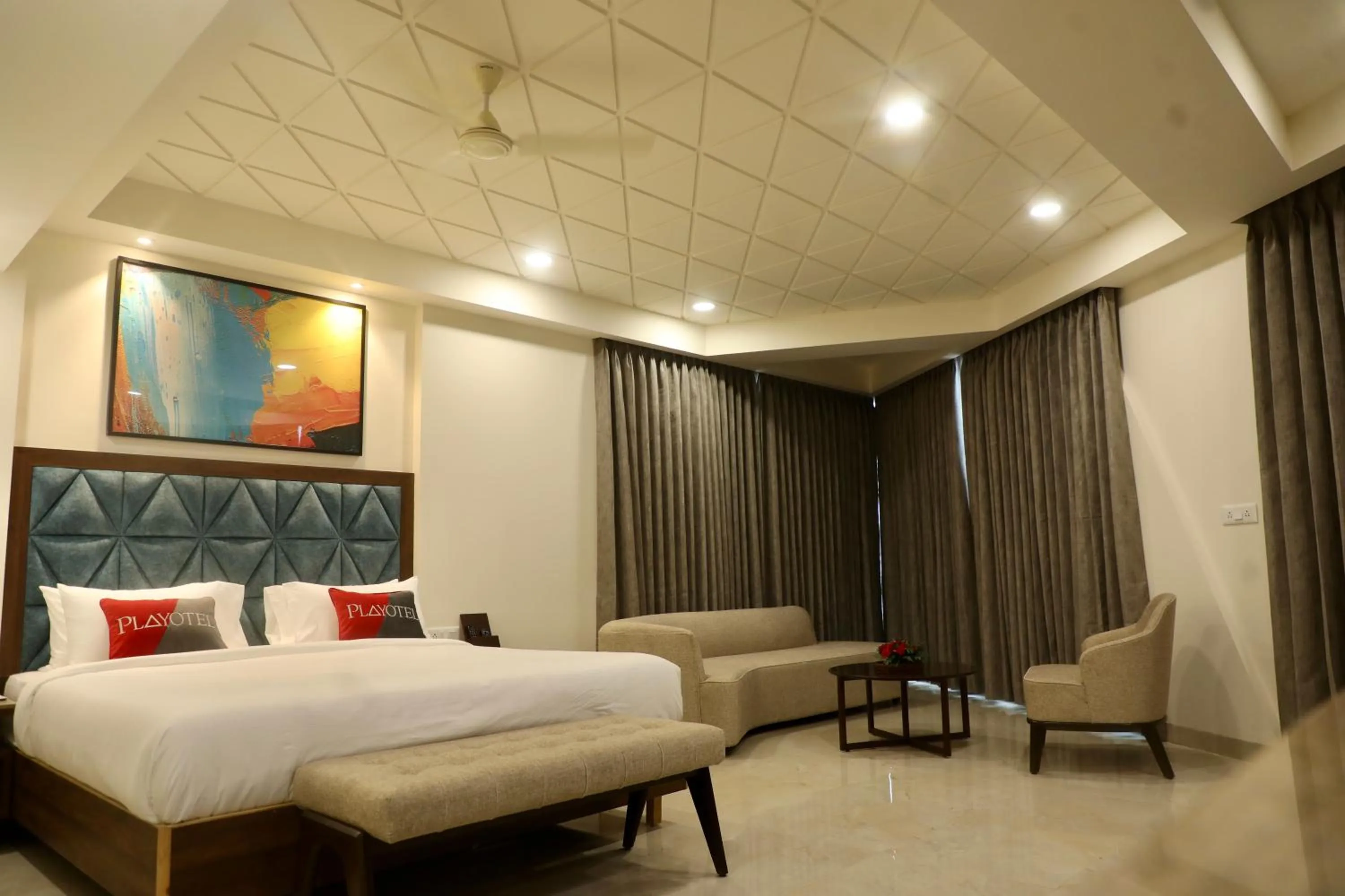 Bed in Playotel Premier Guna