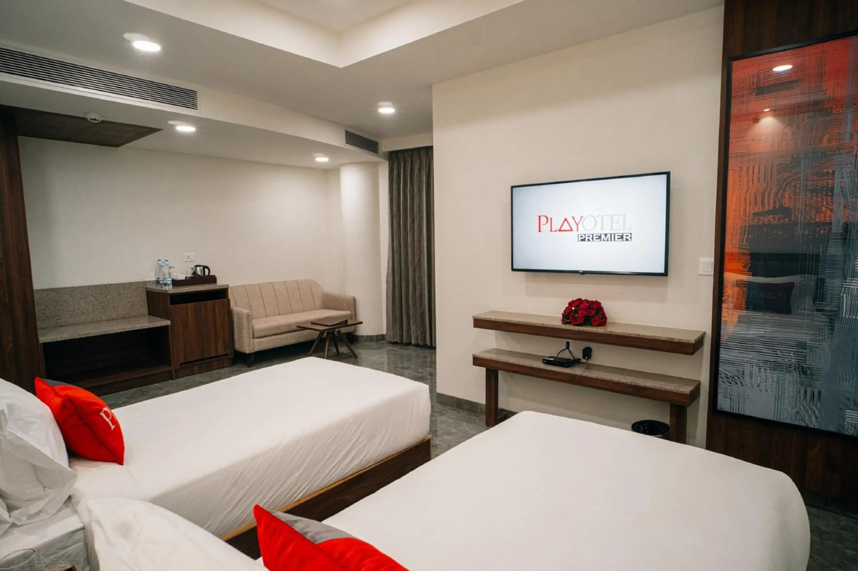 Bed in Playotel Premier Guna