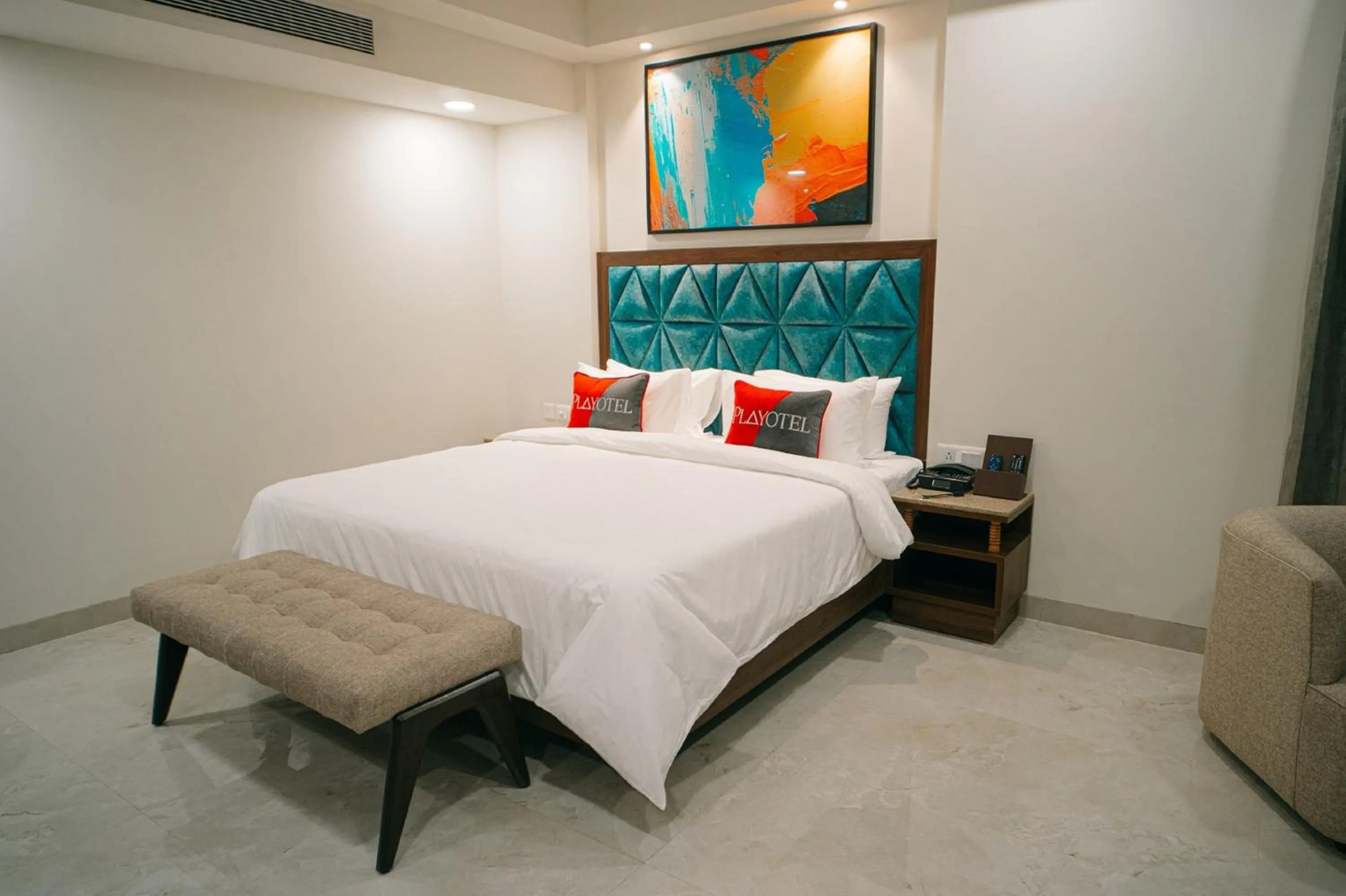 Bed in Playotel Premier Guna