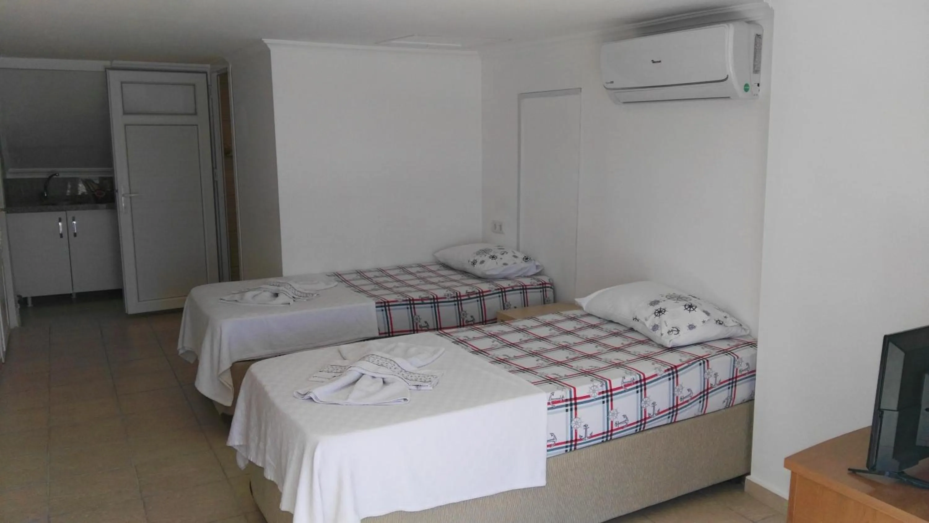 Bed in Uysal Suite and Loft Seaside