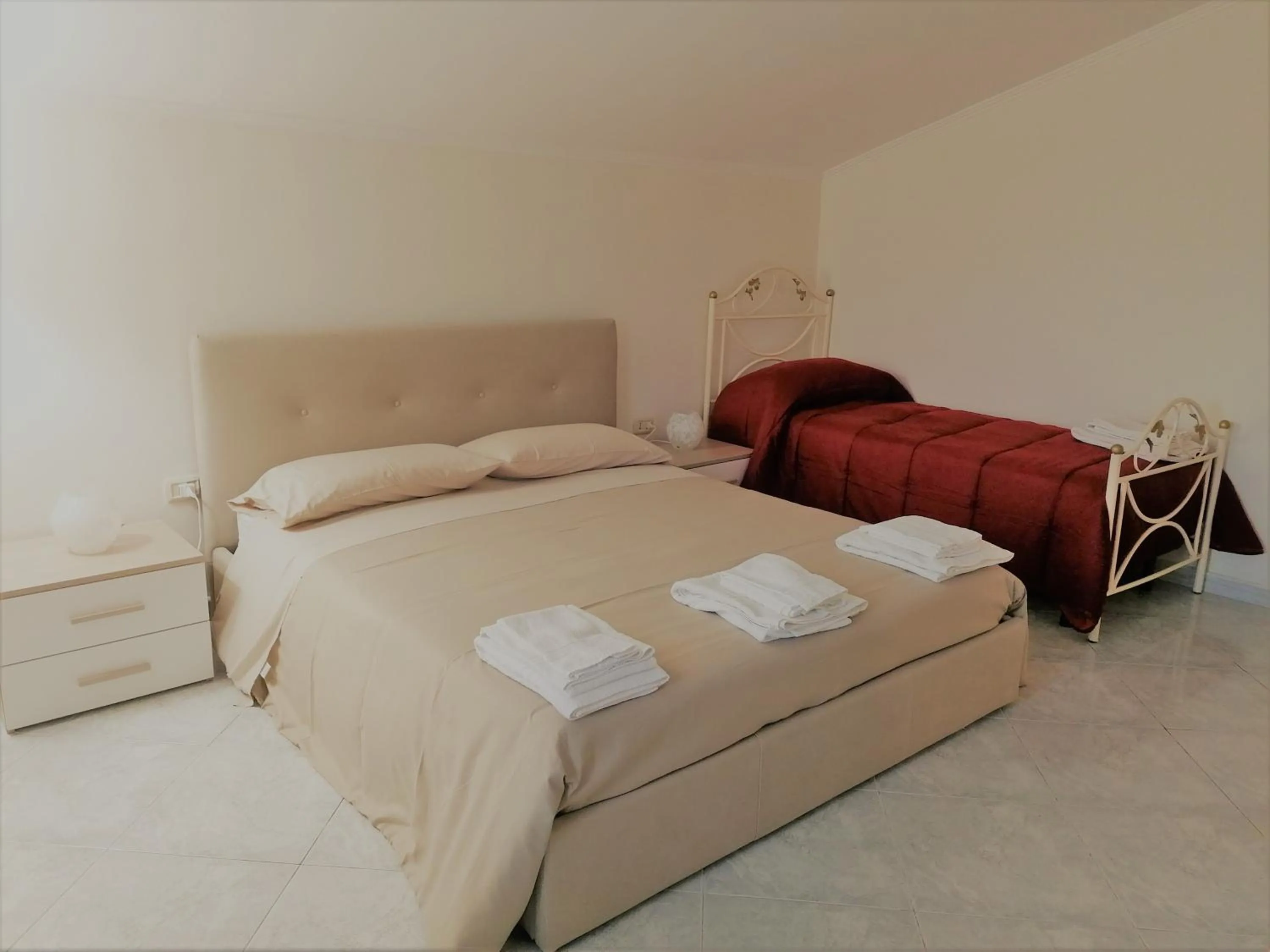 Bed in Rara Domus B&B