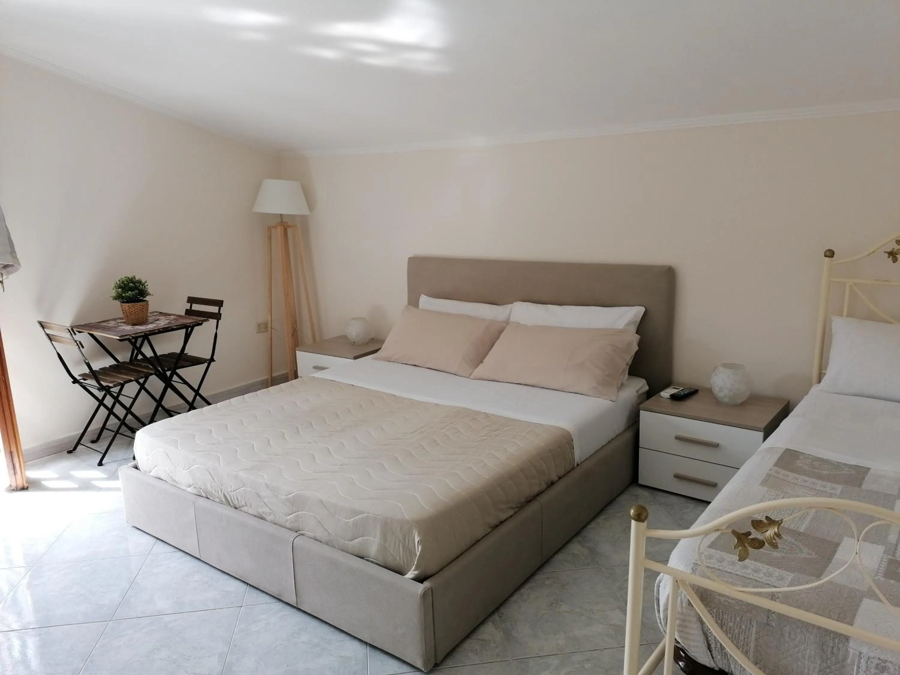 Bed in Rara Domus B&B