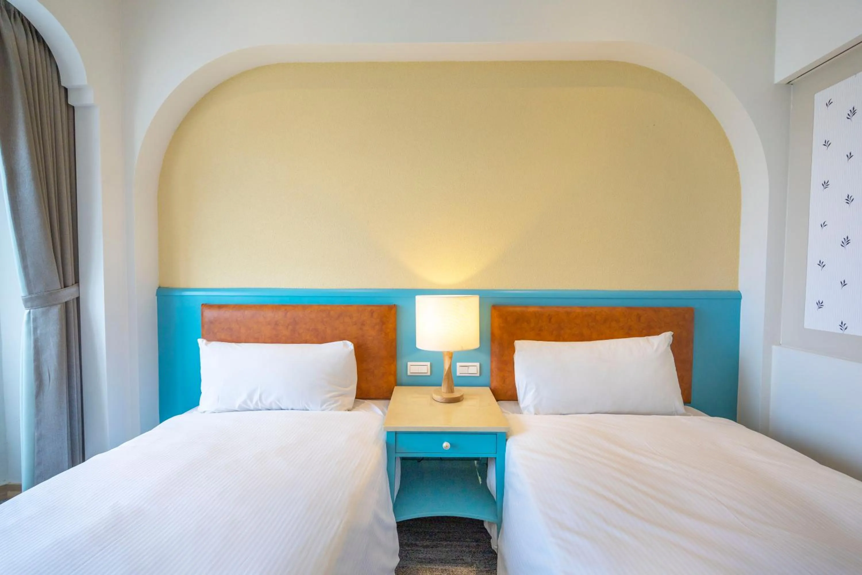 Bed in Kenting Long Beach Hotel