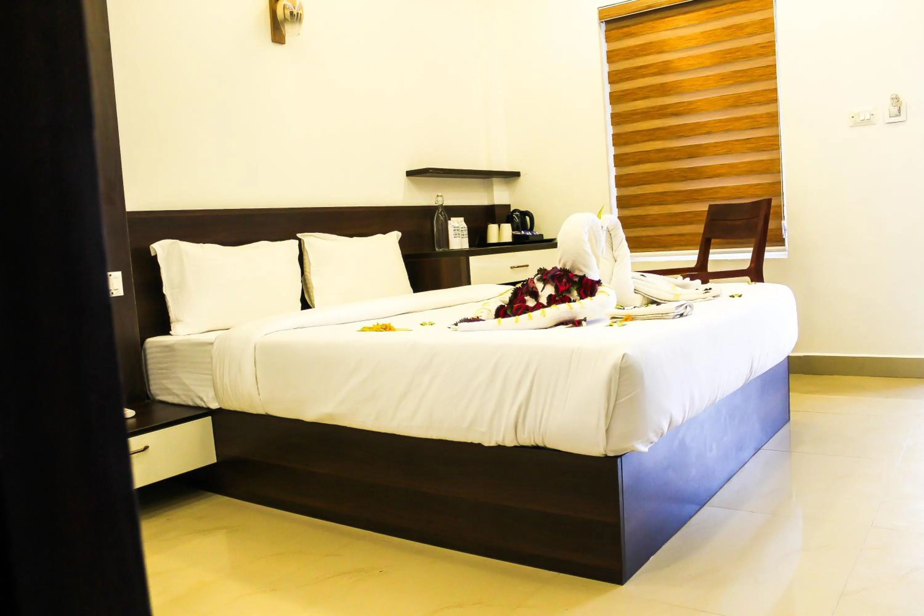 Bed in Ramee Wolkenburg Resort & Spa, Munnar