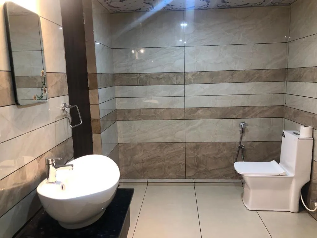 Toilet in Ramee Wolkenburg Resort & Spa, Munnar