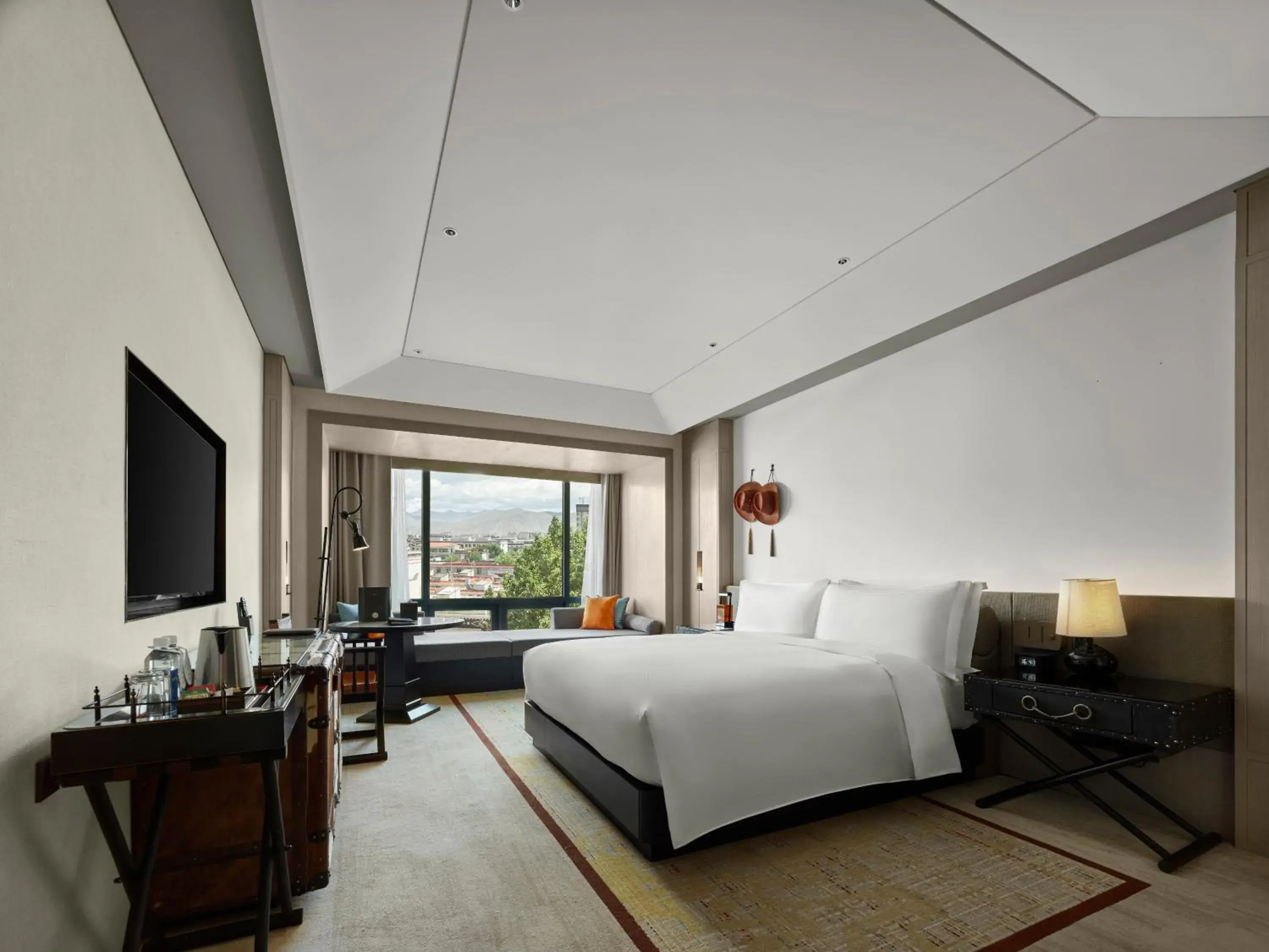 Seating area, Bed in Hilton Shigatse Seating area, Bed in Hilton Shigatse