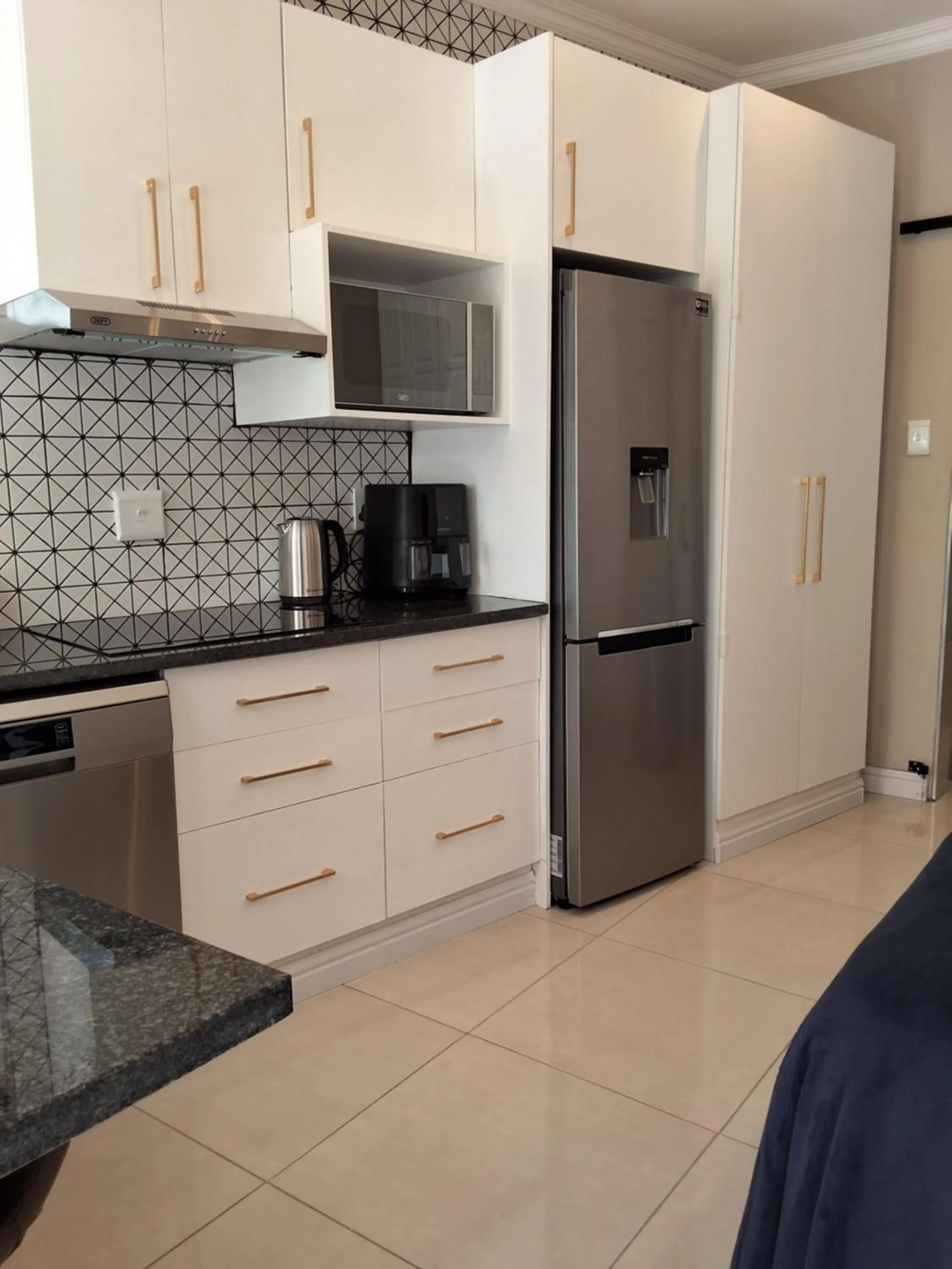 Coffee/tea facilities in CityView, a stunning modern apartment