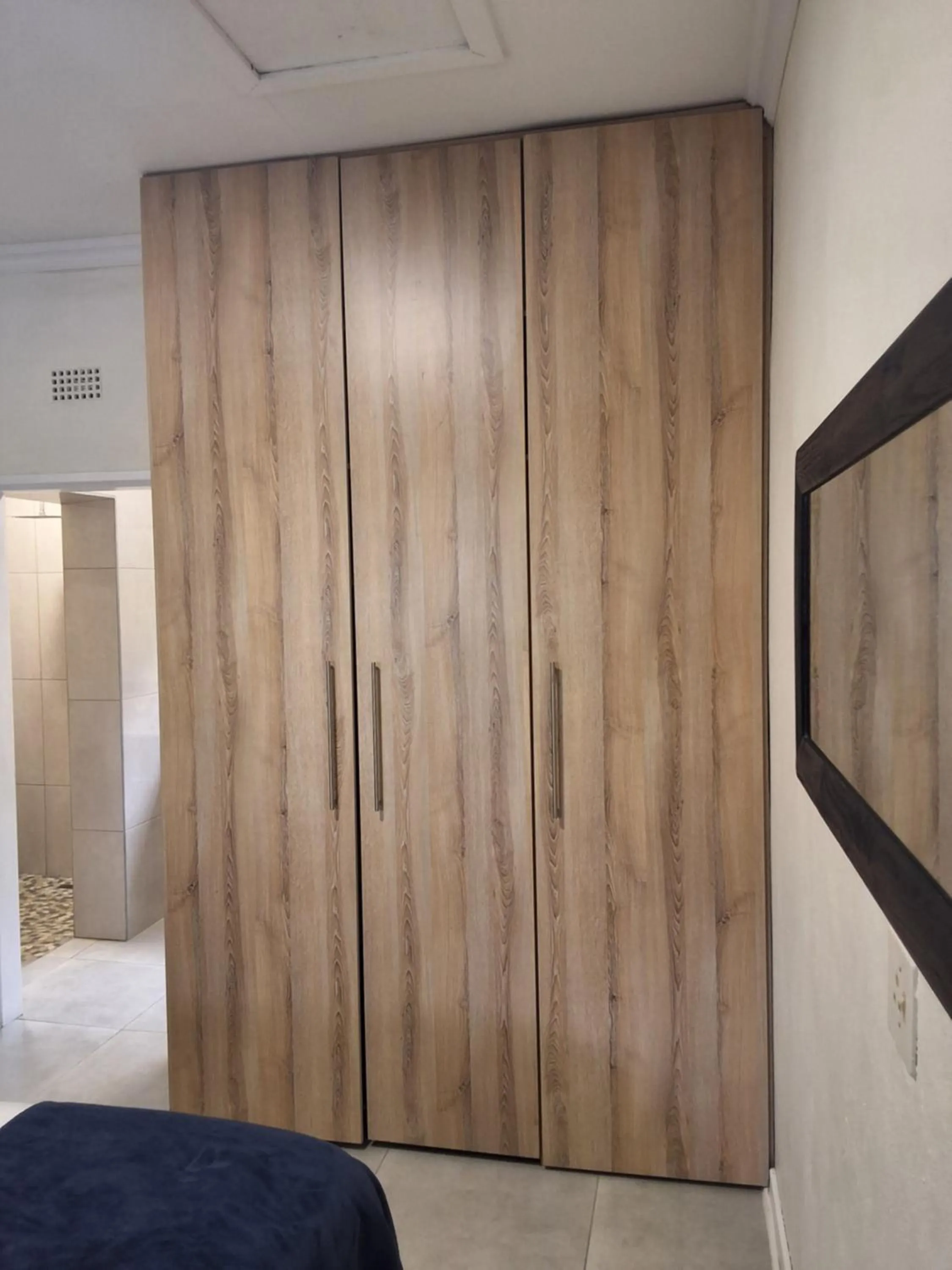 wardrobe in CityView, a stunning modern apartment