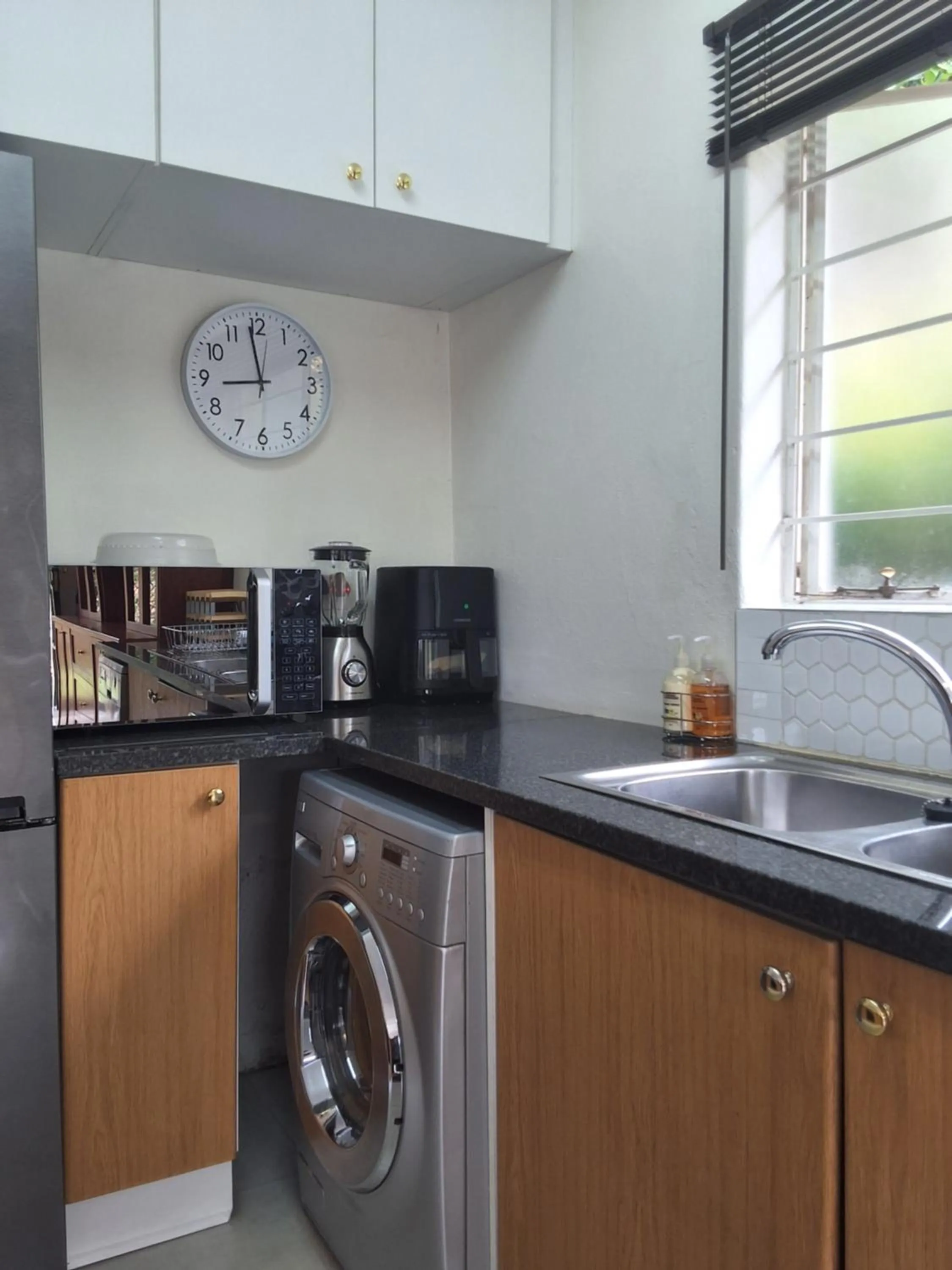 microwave in CityView, a stunning modern apartment