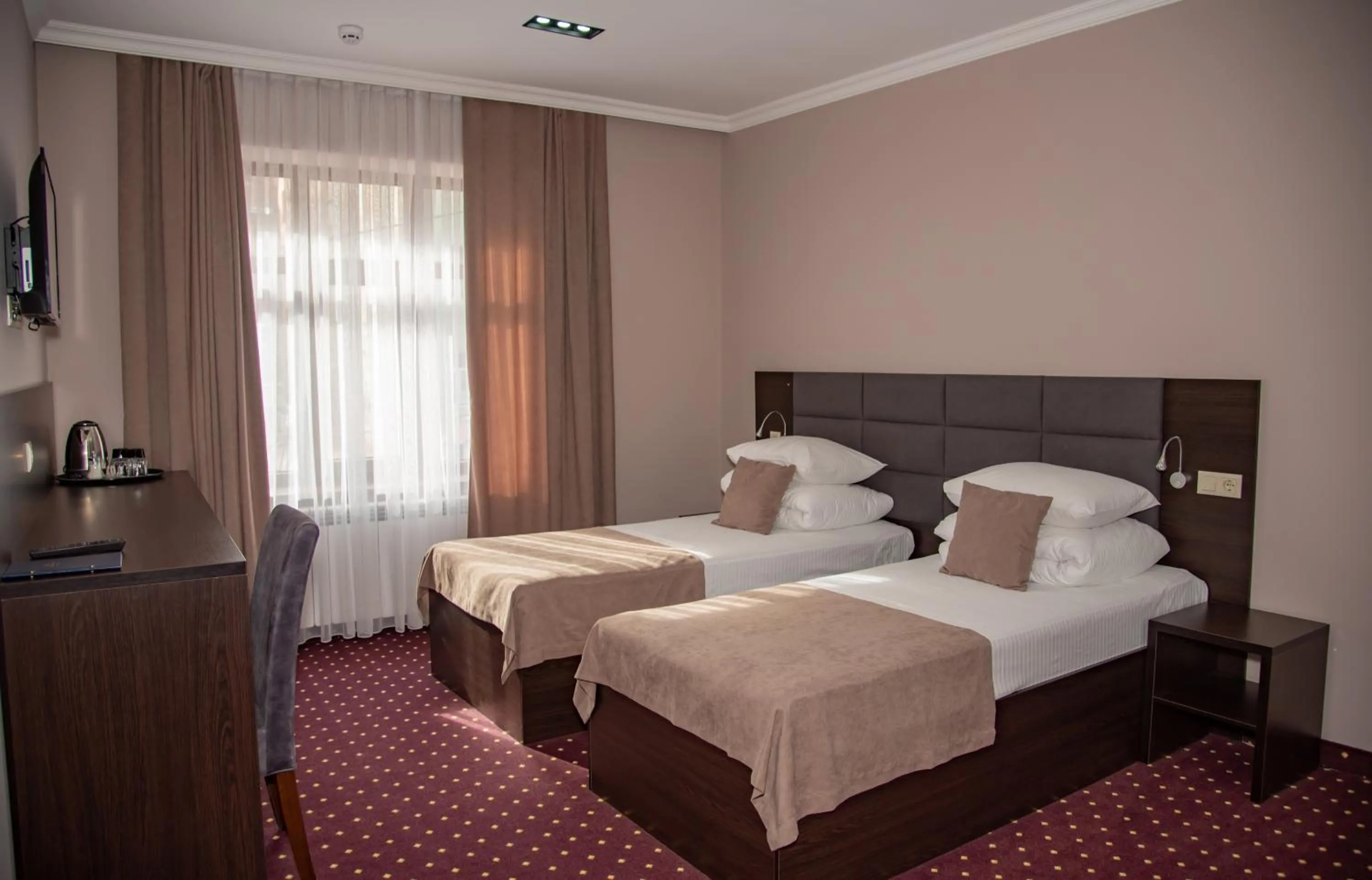 Bed in T&S Apart-Hotel