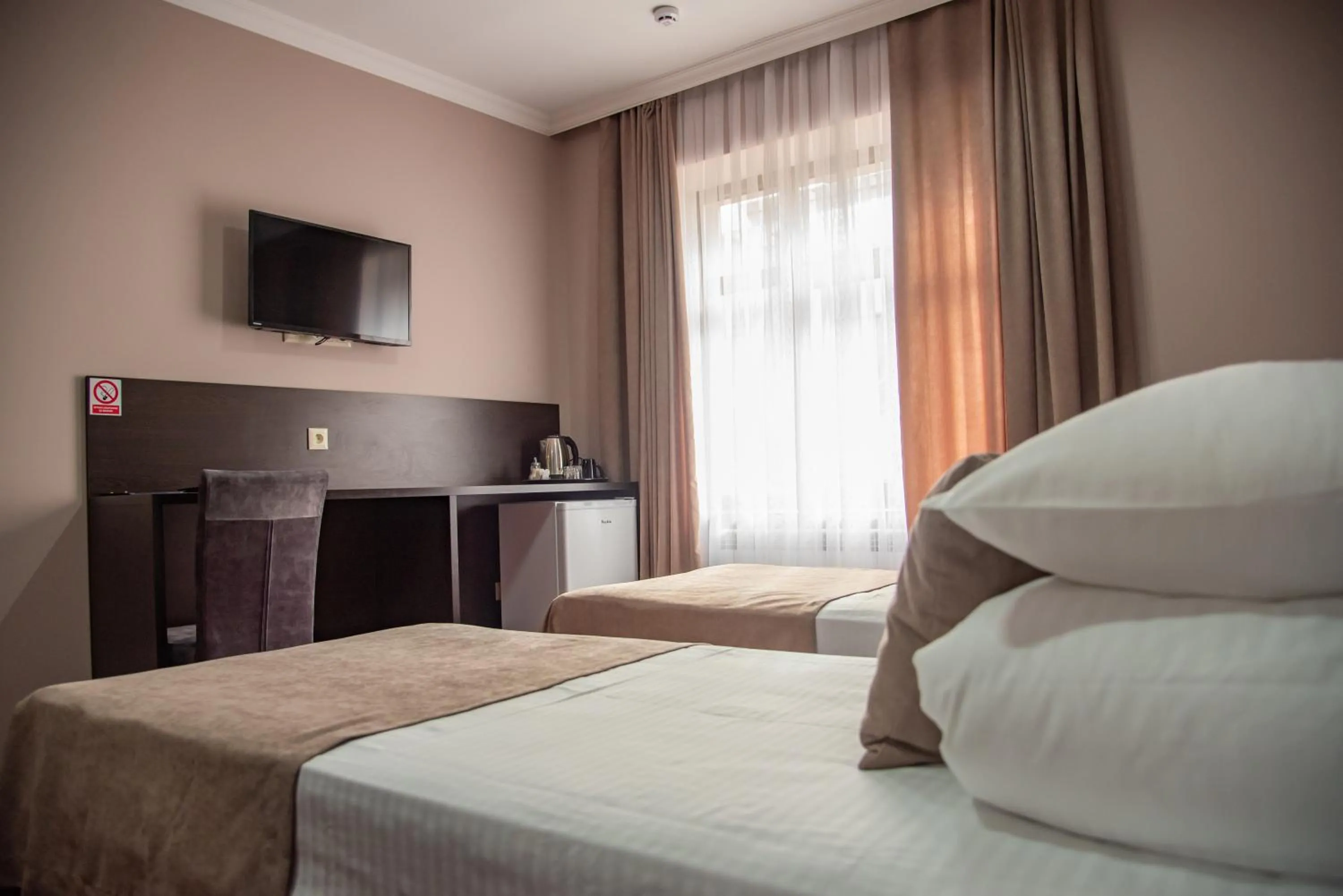Communal lounge/ TV room, Bed in T&S Apart-Hotel