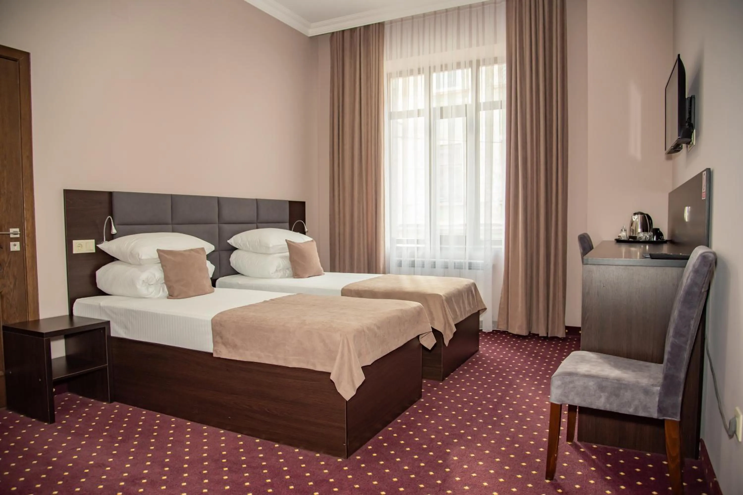 Bed in T&S Apart-Hotel
