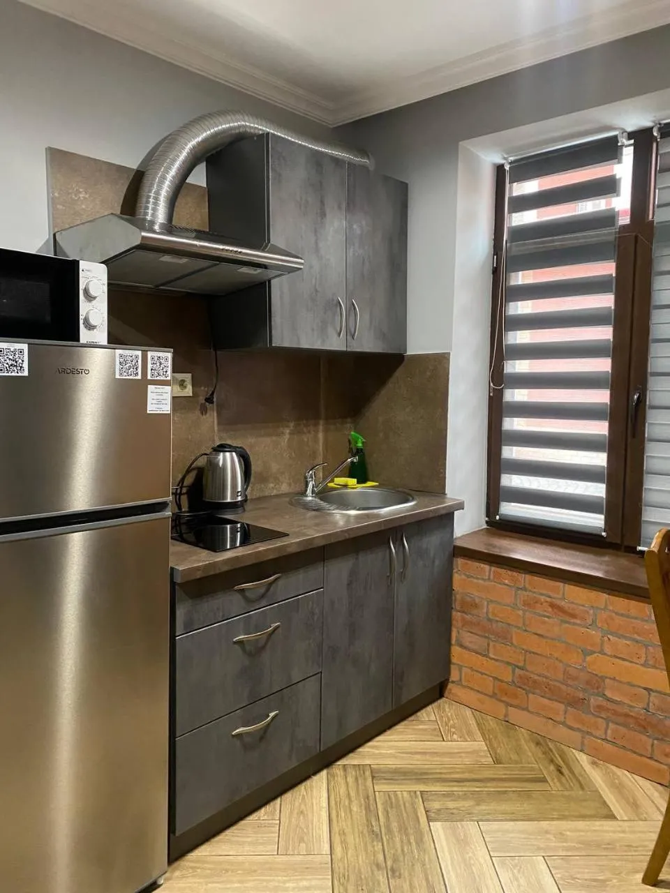 Kitchen or kitchenette in T&S Apart-Hotel
