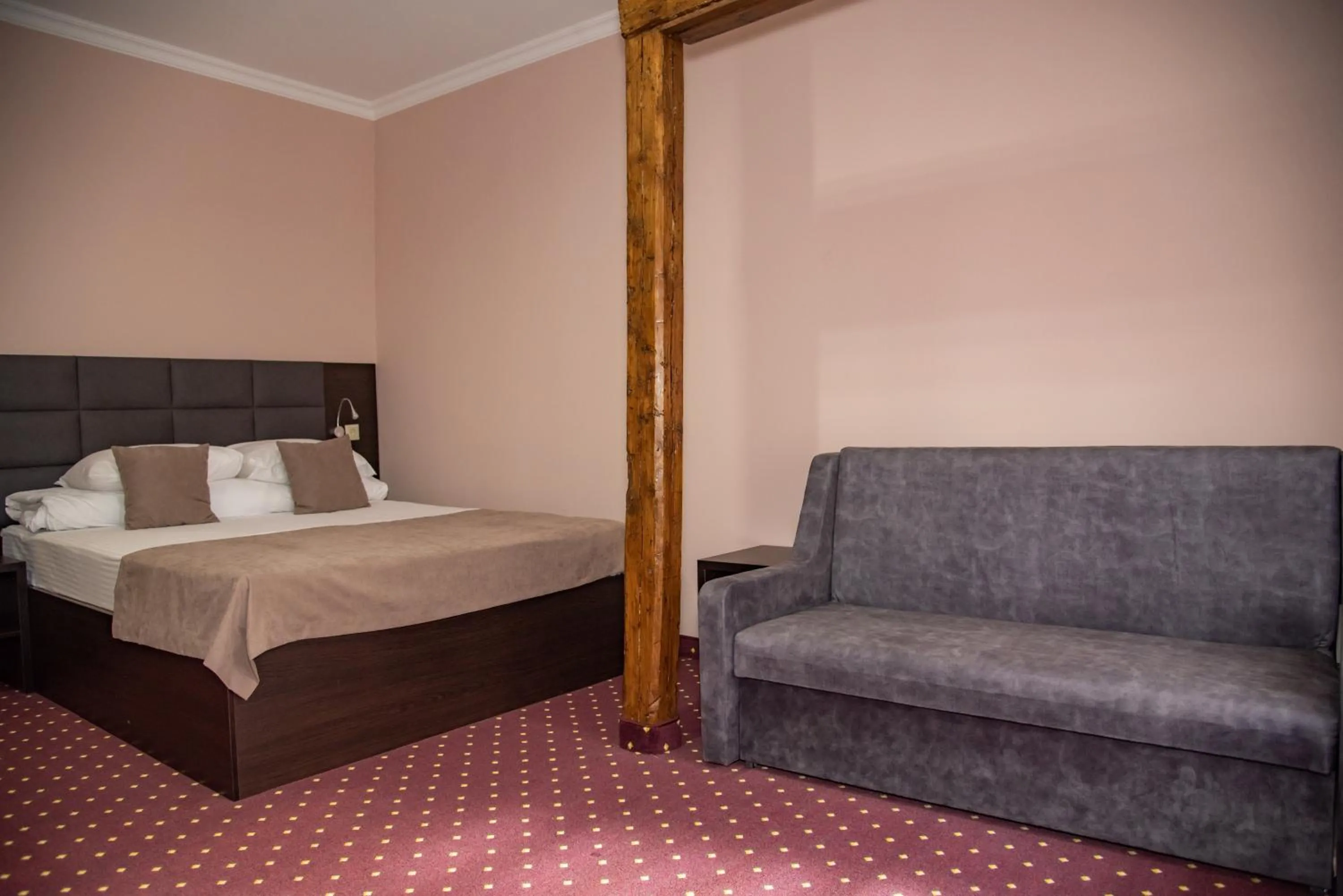 Bed in T&S Apart-Hotel