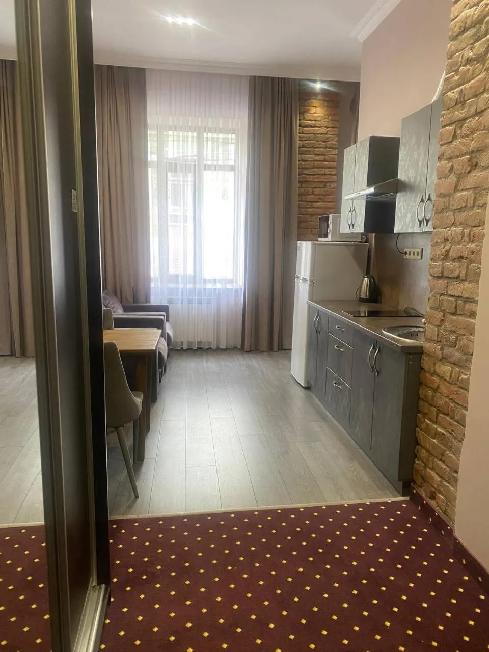 Kitchen or kitchenette in T&S Apart-Hotel