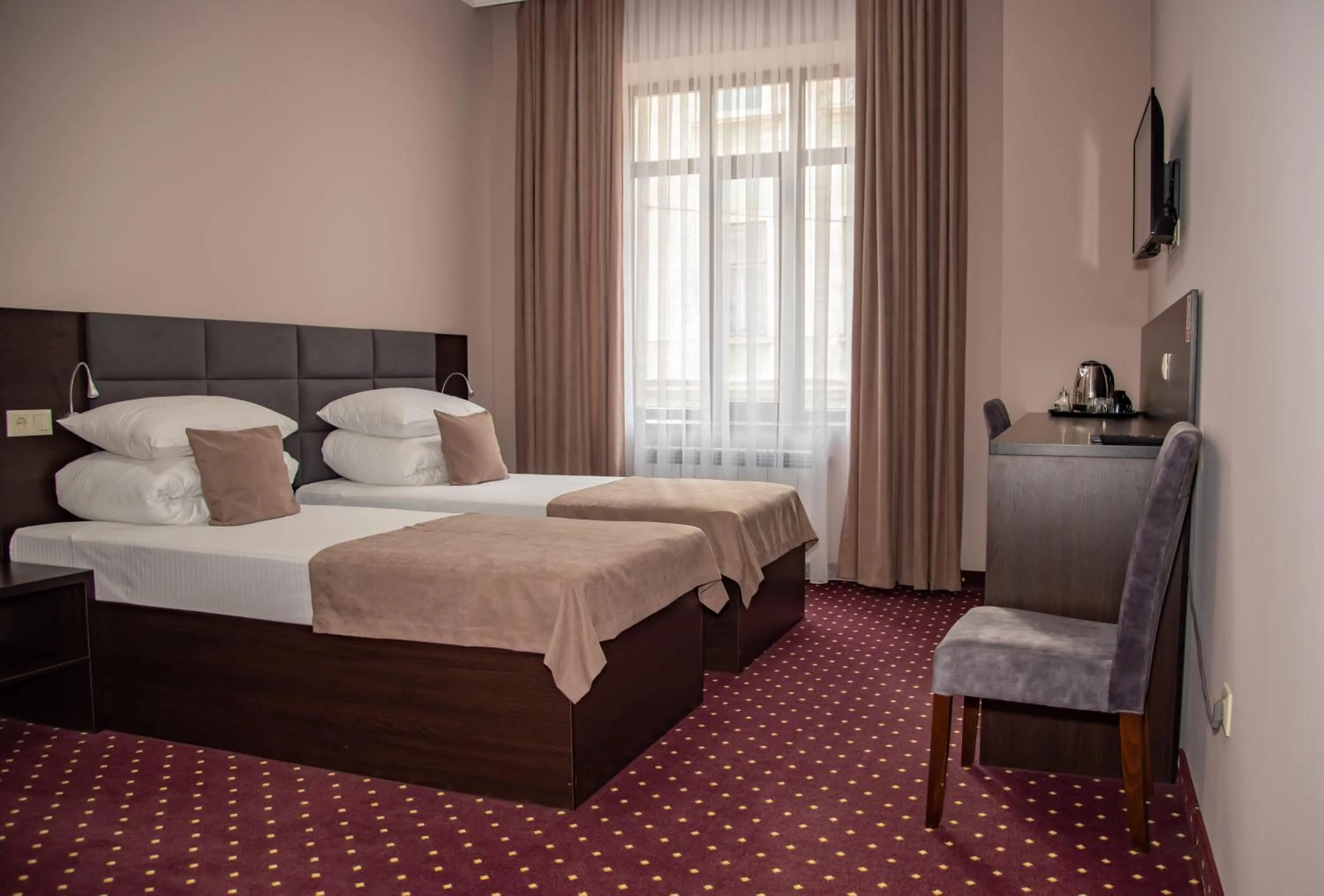 Bed in T&S Apart-Hotel
