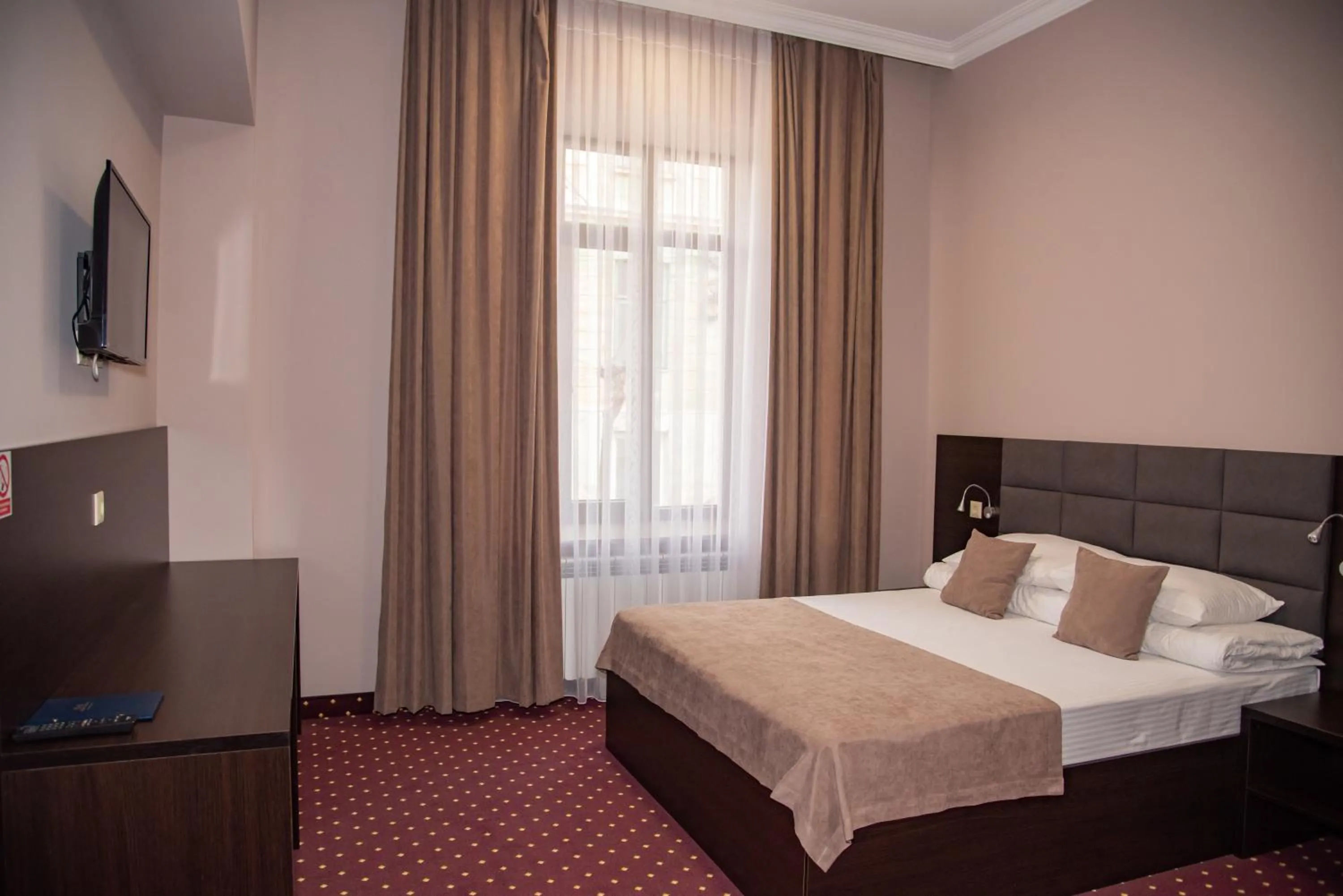 Bed in T&S Apart-Hotel
