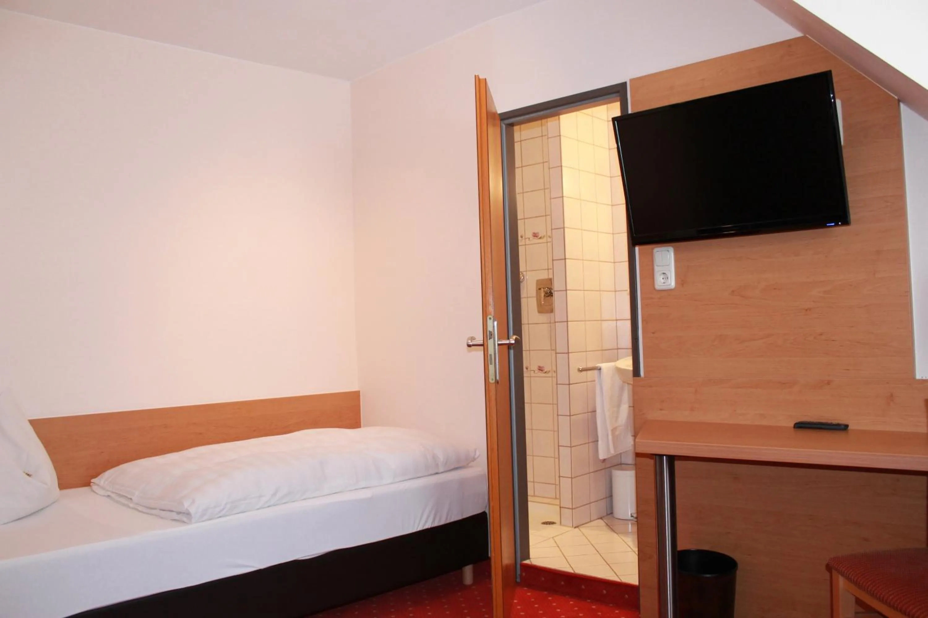 Photo of the whole room, Bed in Hotel Hübler