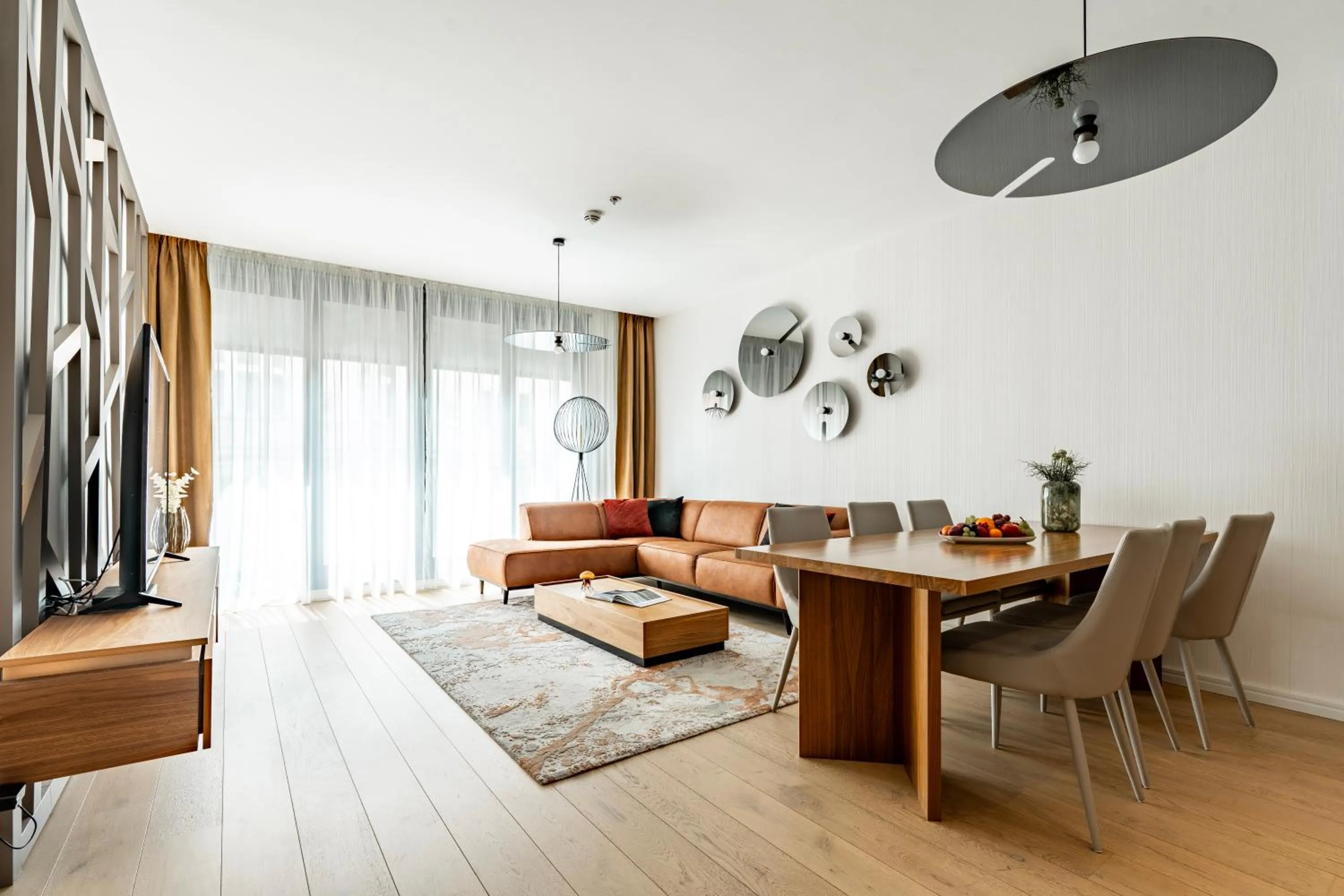 Living room in Emerald Downtown Luxury Suites by Continental Group