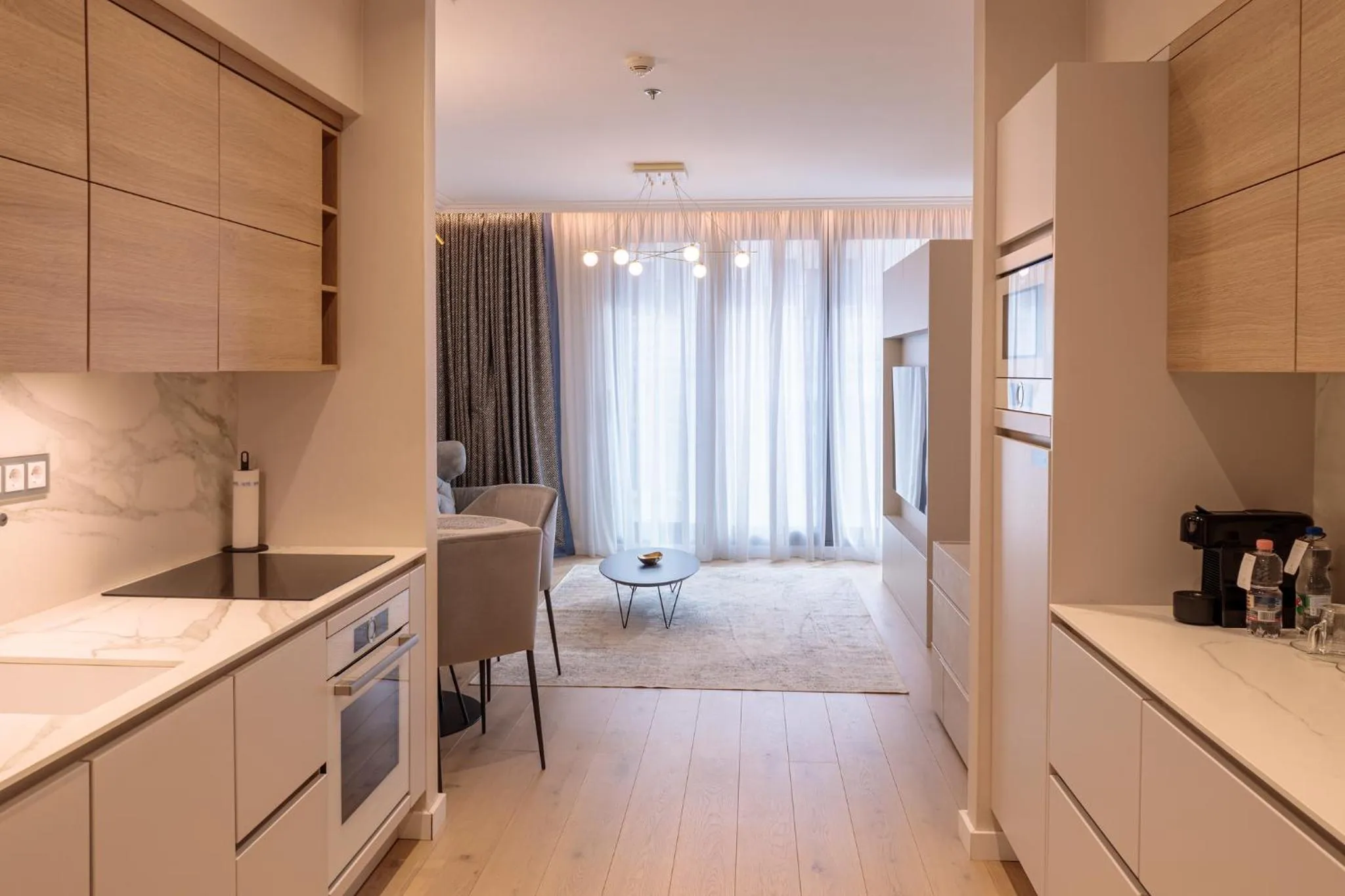 kitchen in Emerald Downtown Luxury Suites by Continental Group